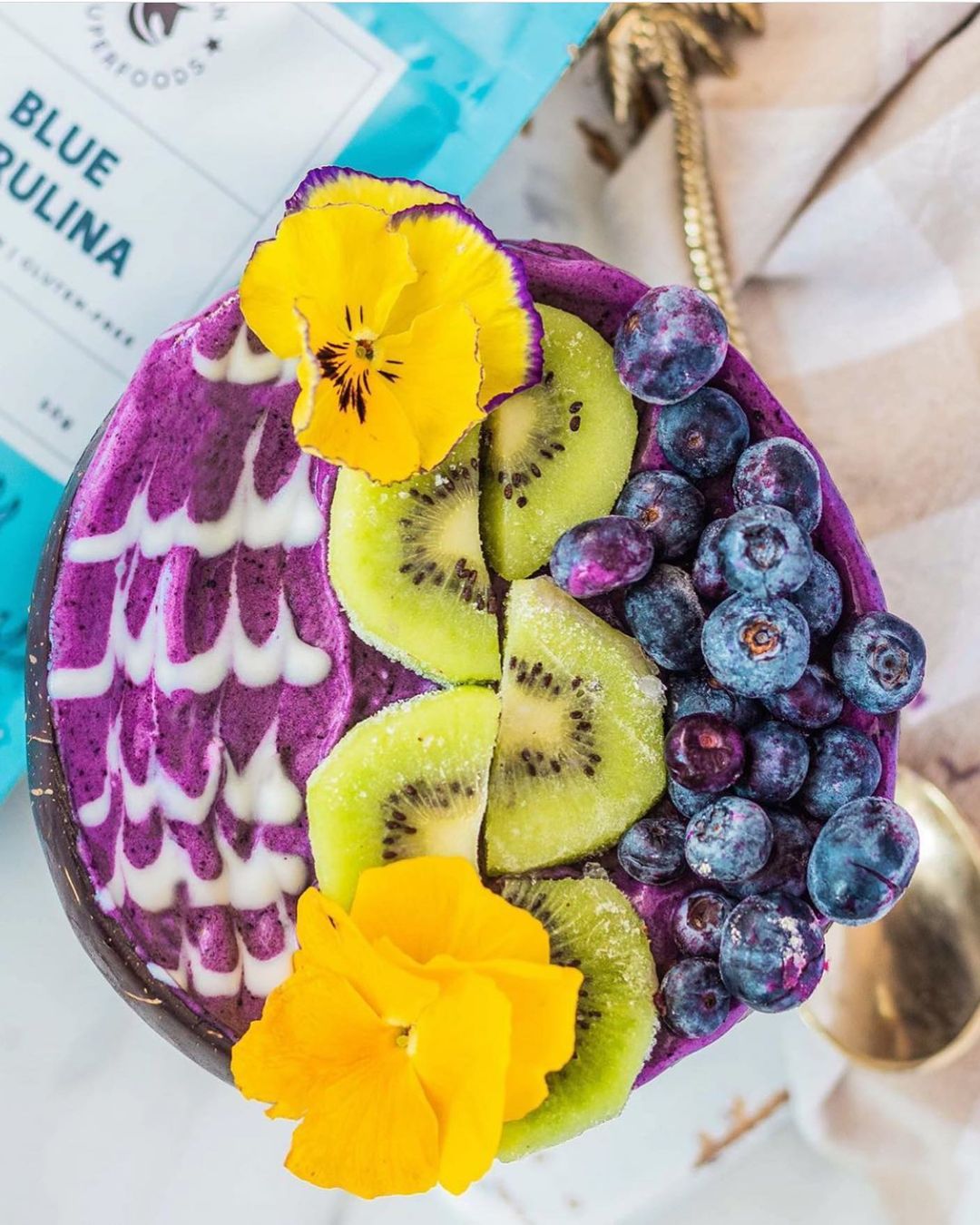 Purple Smoothie Bowl with Kiwi and Blueberries