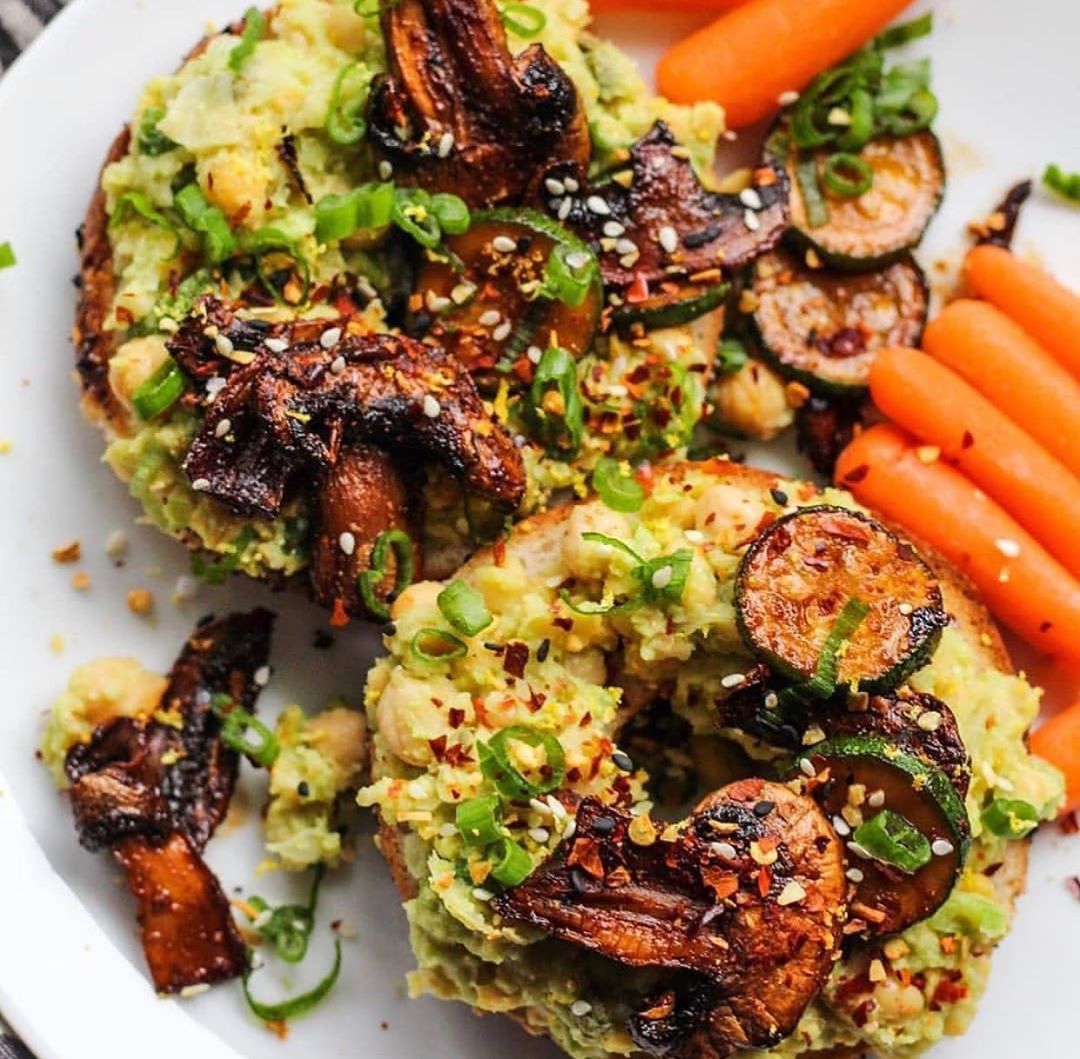 Bagels Topped with Some Avocado Smashed Chickpeas
