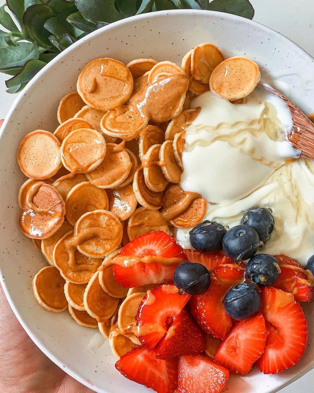 Vegan Pancake Cereal with Syrup and Berries