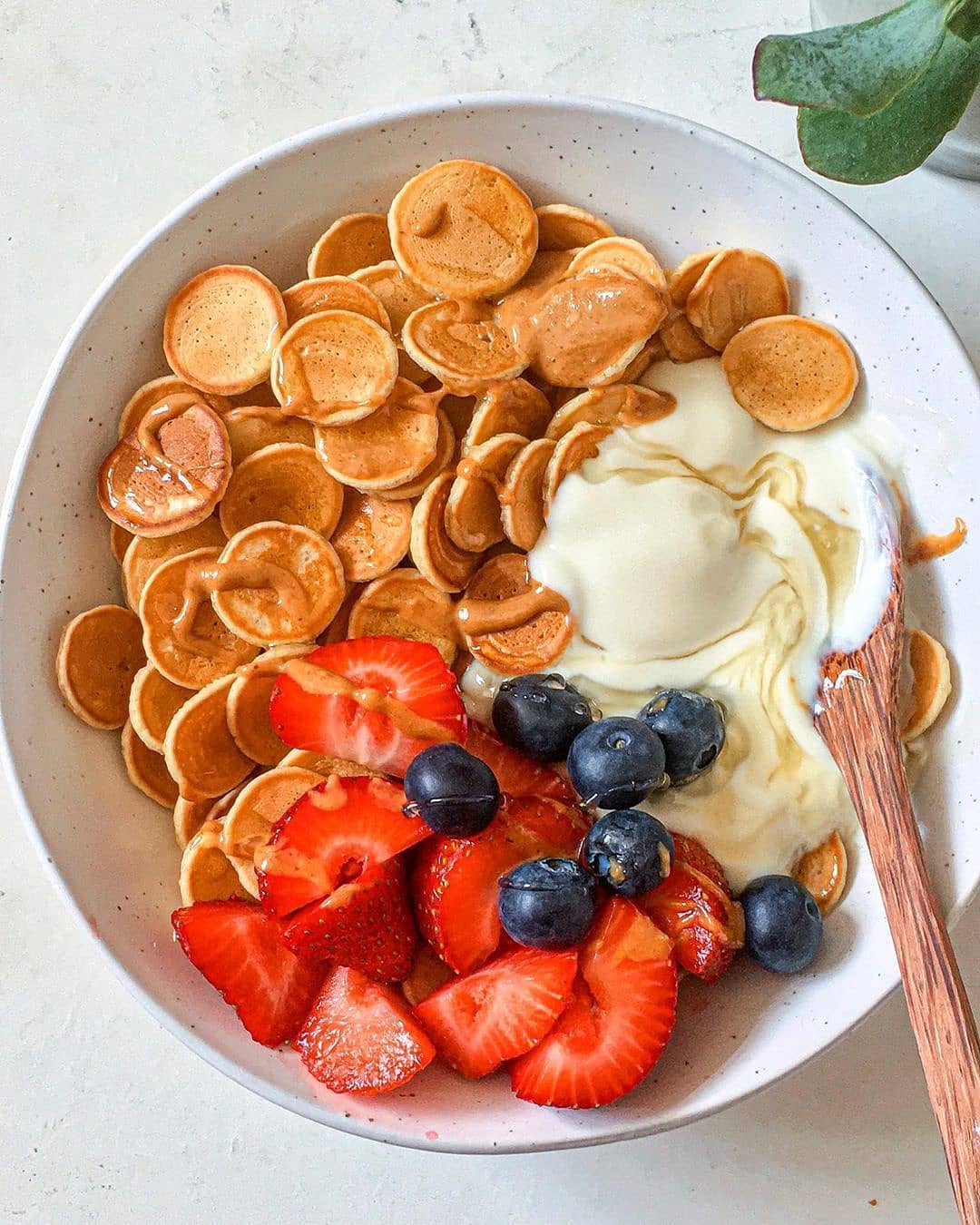Vegan Pancake Cereal with Syrup and Berries