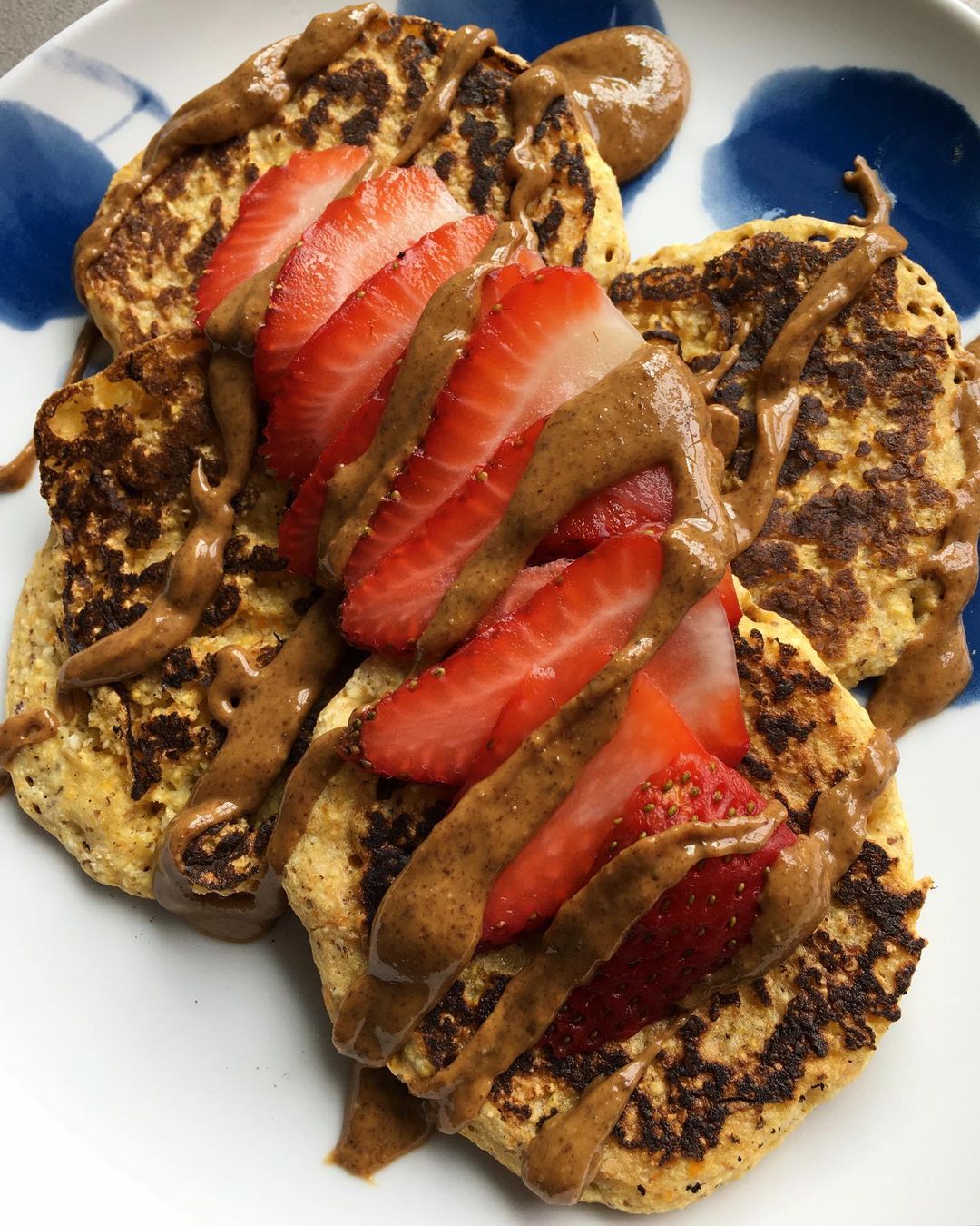 Creative Cornmeal Pancakes with Almond Butter and Strawberries