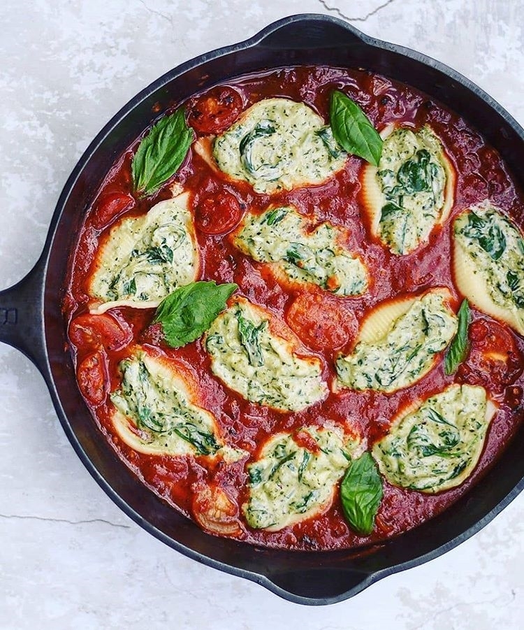 Basil Pesto and Cashew Cream Stuffed Shells in Tomato Sauce