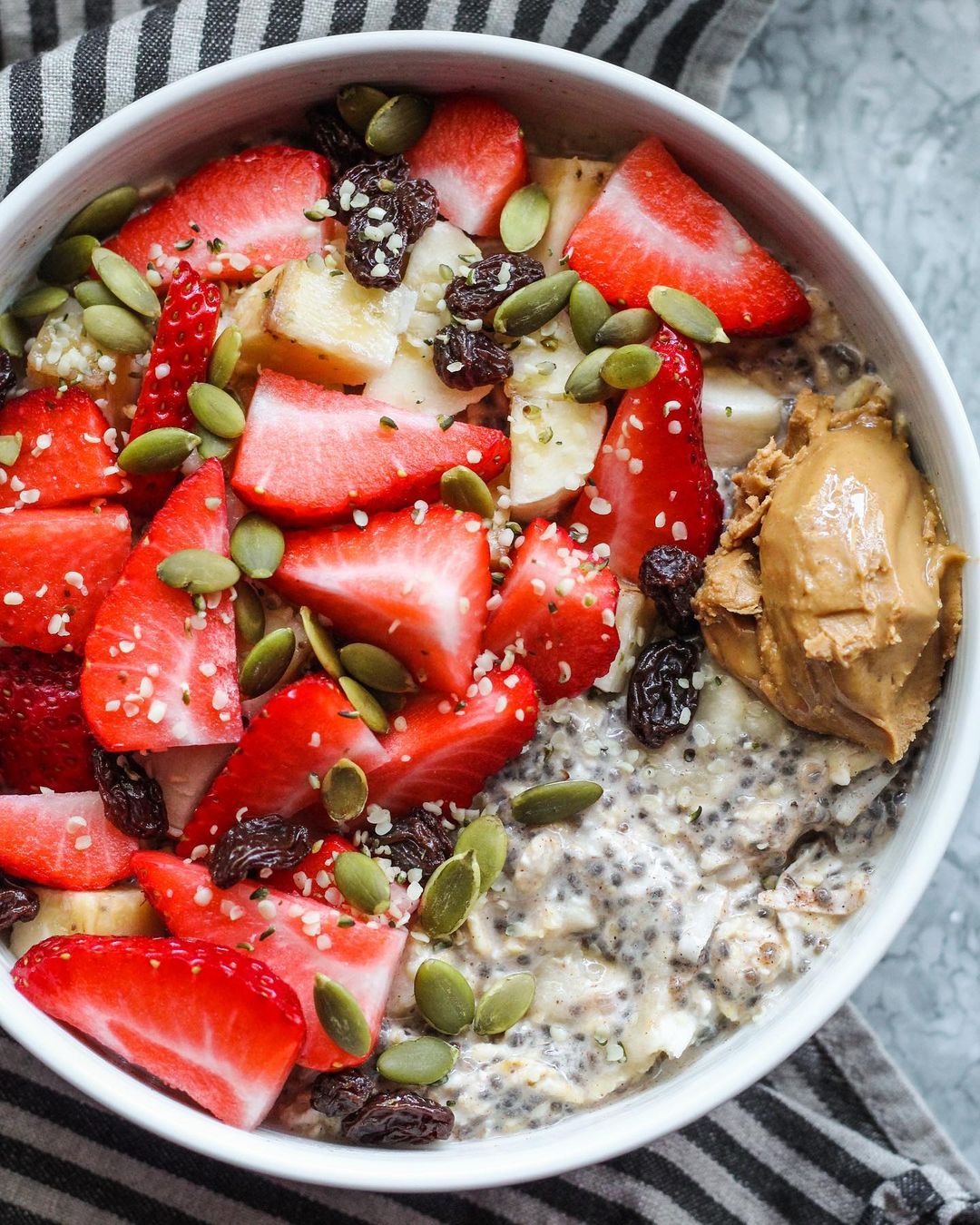 Creamy Cardamom Oats with Strawberries and Nut Butter