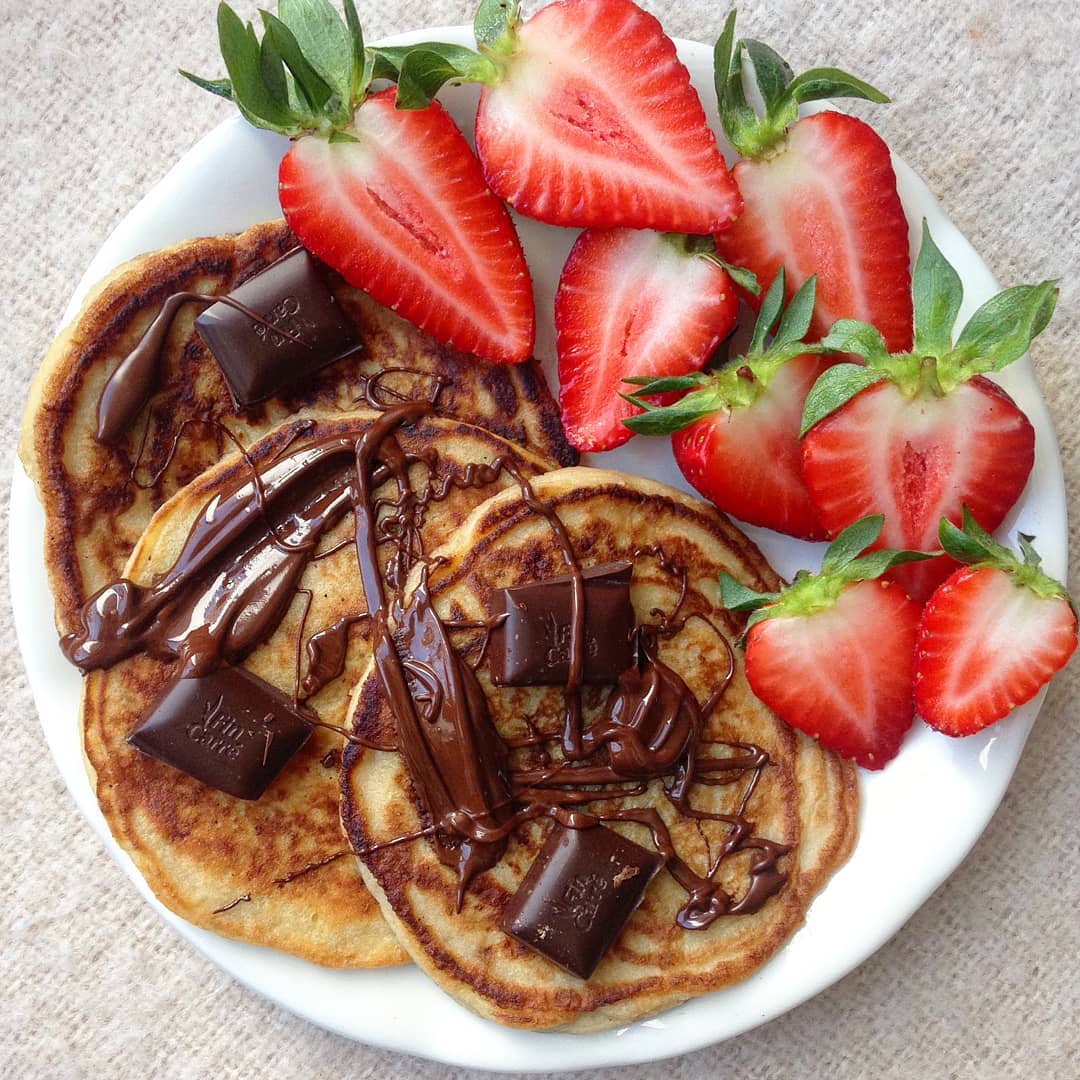 Banana Bread Pancakes with Chocolate and Strawberries