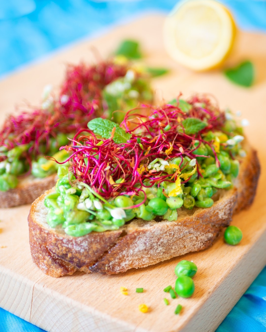 Sourdough Toast with Smashed Creamy Lemon Peas, Mint and Pink Sprouts