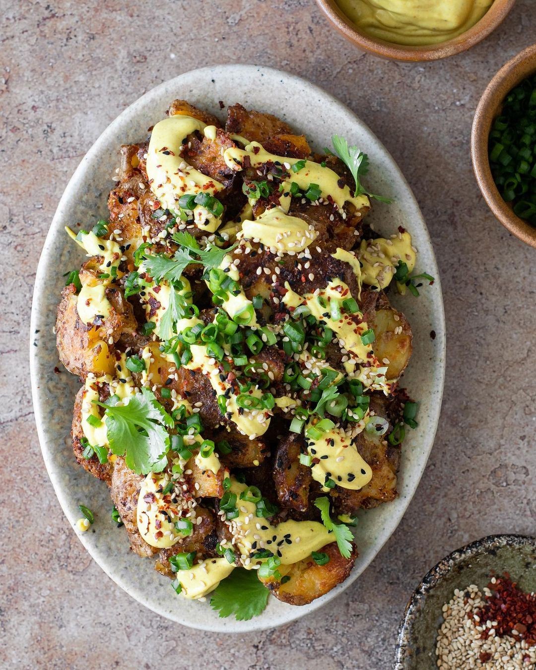 Crispy Smashed New Potatoes with Curry & Tahini Dip