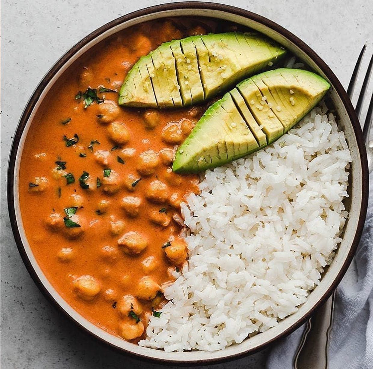 Stewed Tomato Chickpea Curry with Rice and Avocado