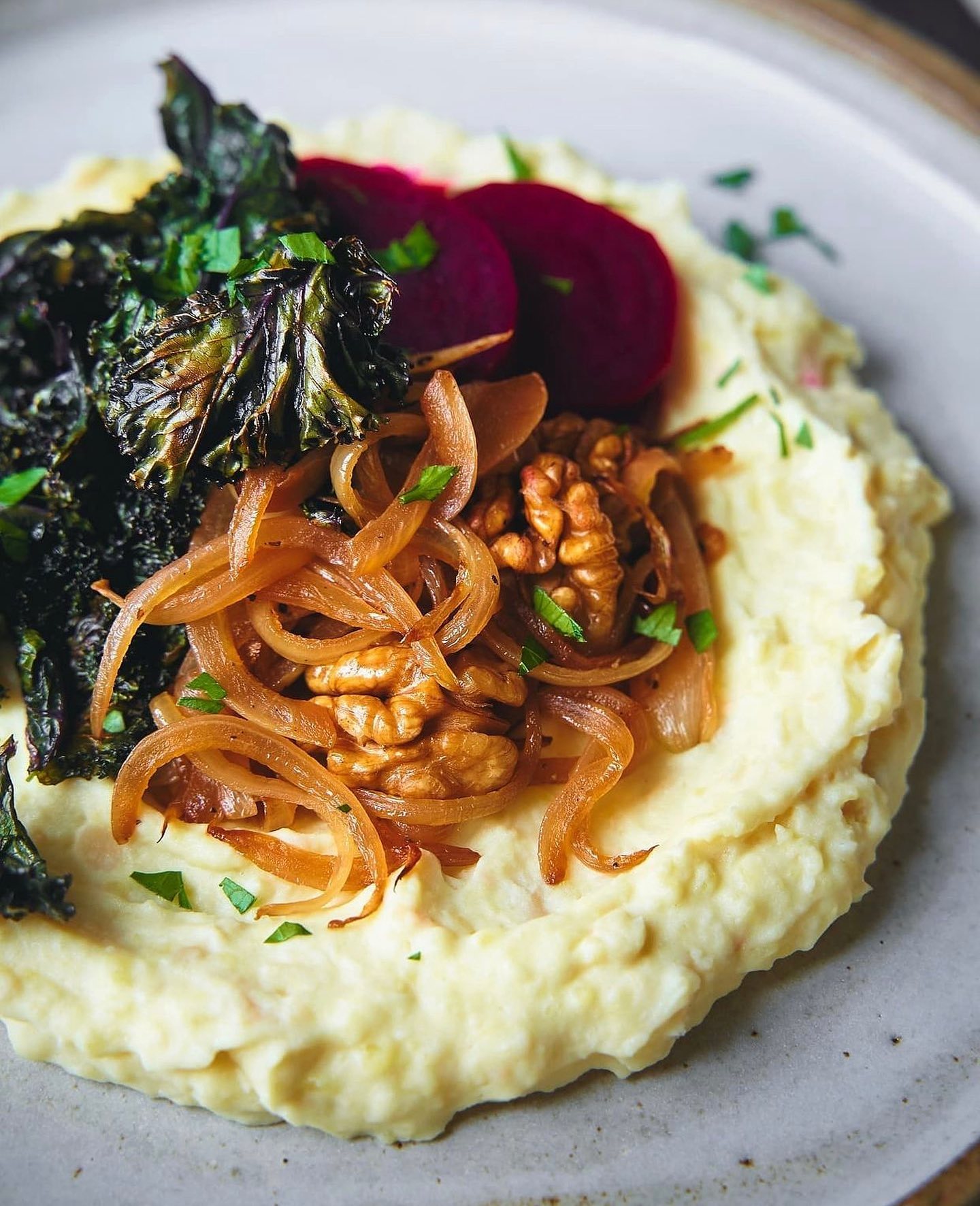 Creamy Potato and Bean Mash with Pickled Beets, Fried Onions, Walnuts, and Crispy Kale