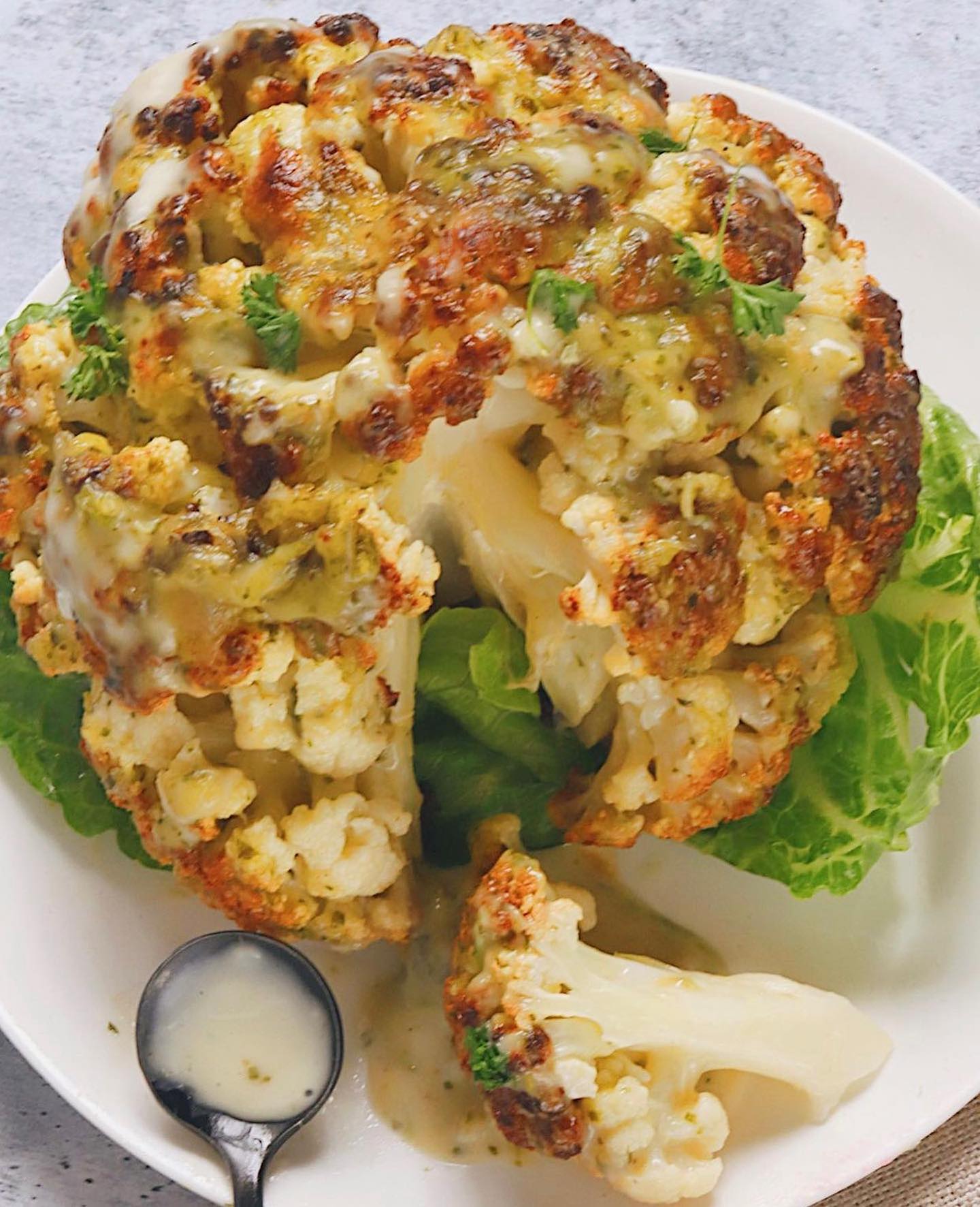 Whole Roasted Cauliflower with Cheesy Pesto