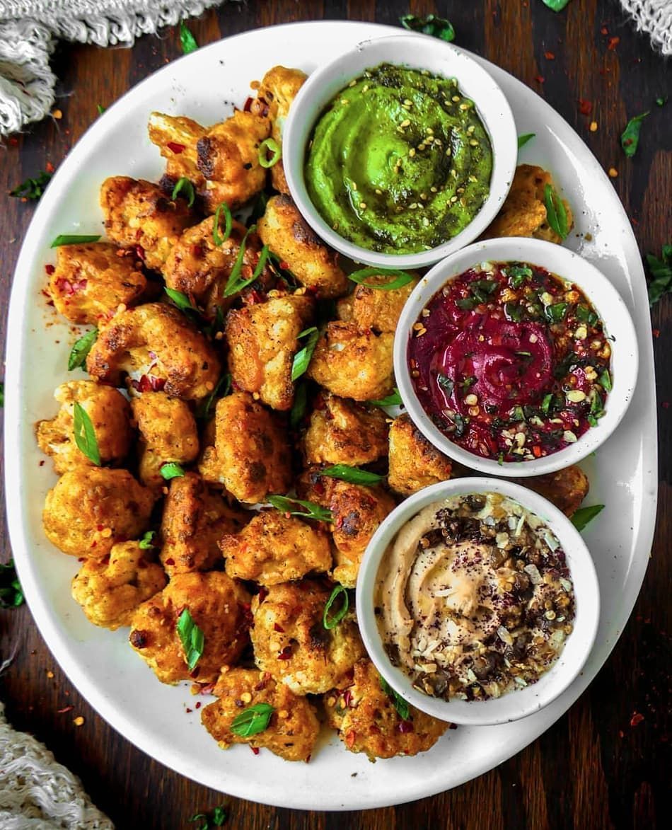 Cauliflower Wings with Beet Pesto, Hummus, and Baba Ganoush