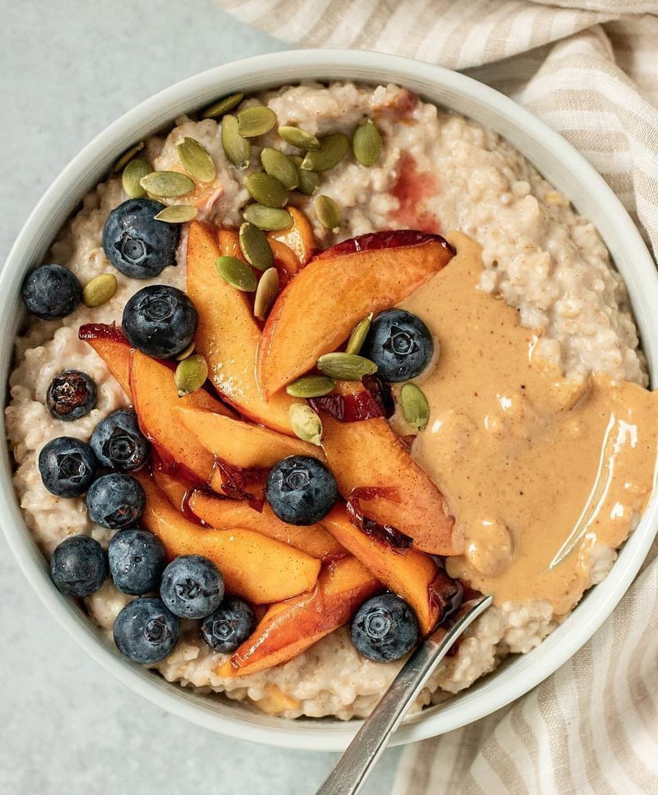Warm Cinnamon Peach Oatmeal Bowl