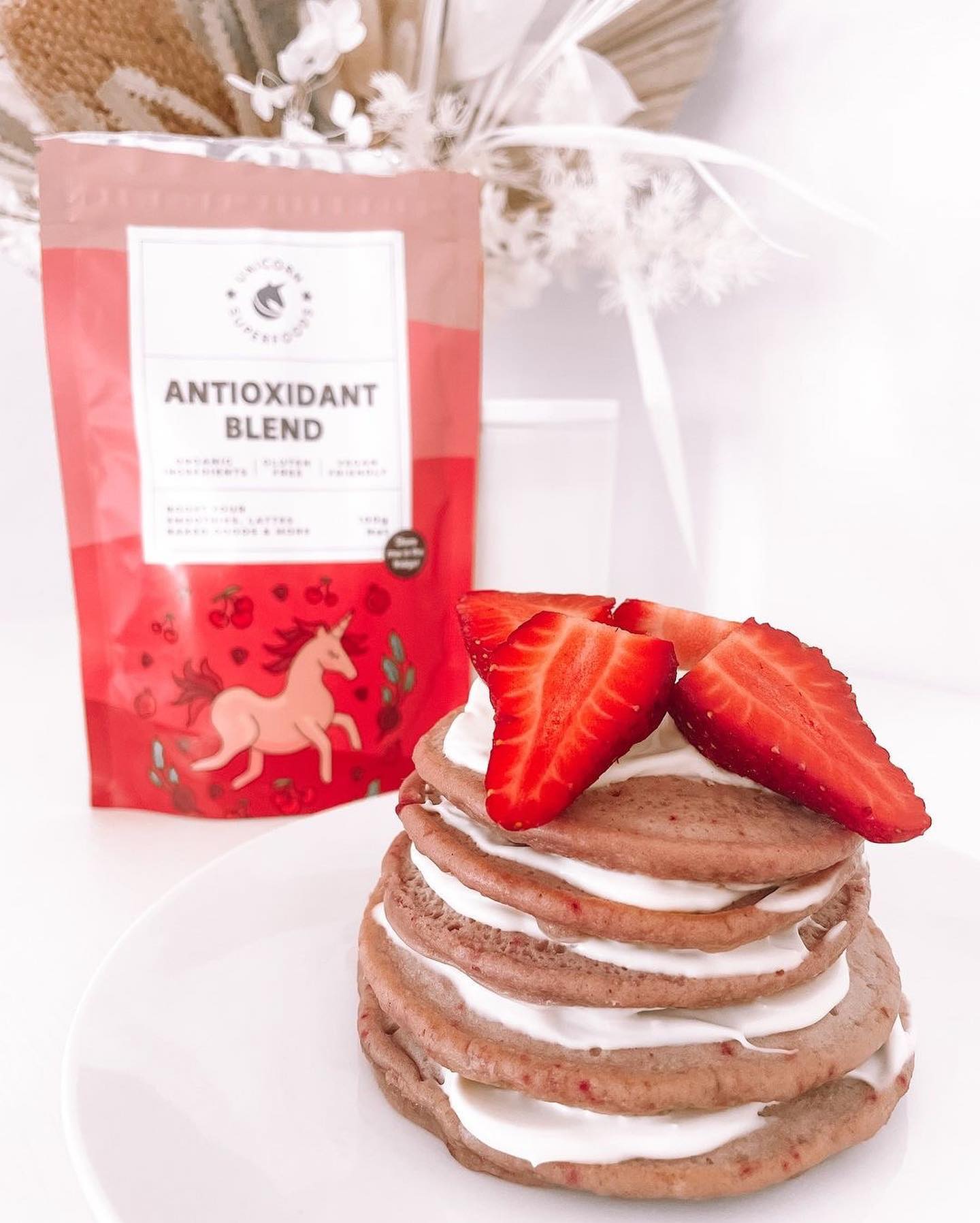 Delightful Pink Pancake Stack with Unicorn Superfoods