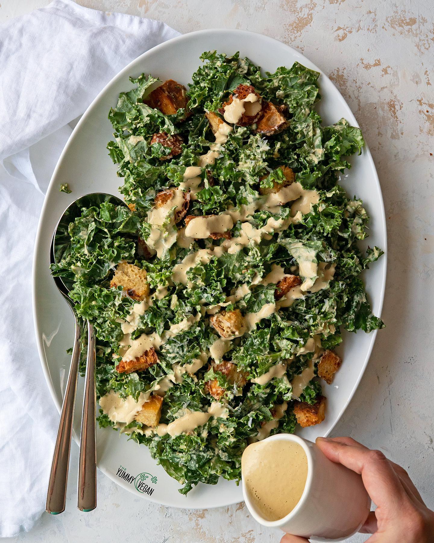 Massaged Kale Caesar Salad with Vegan Parmesan and Croutons