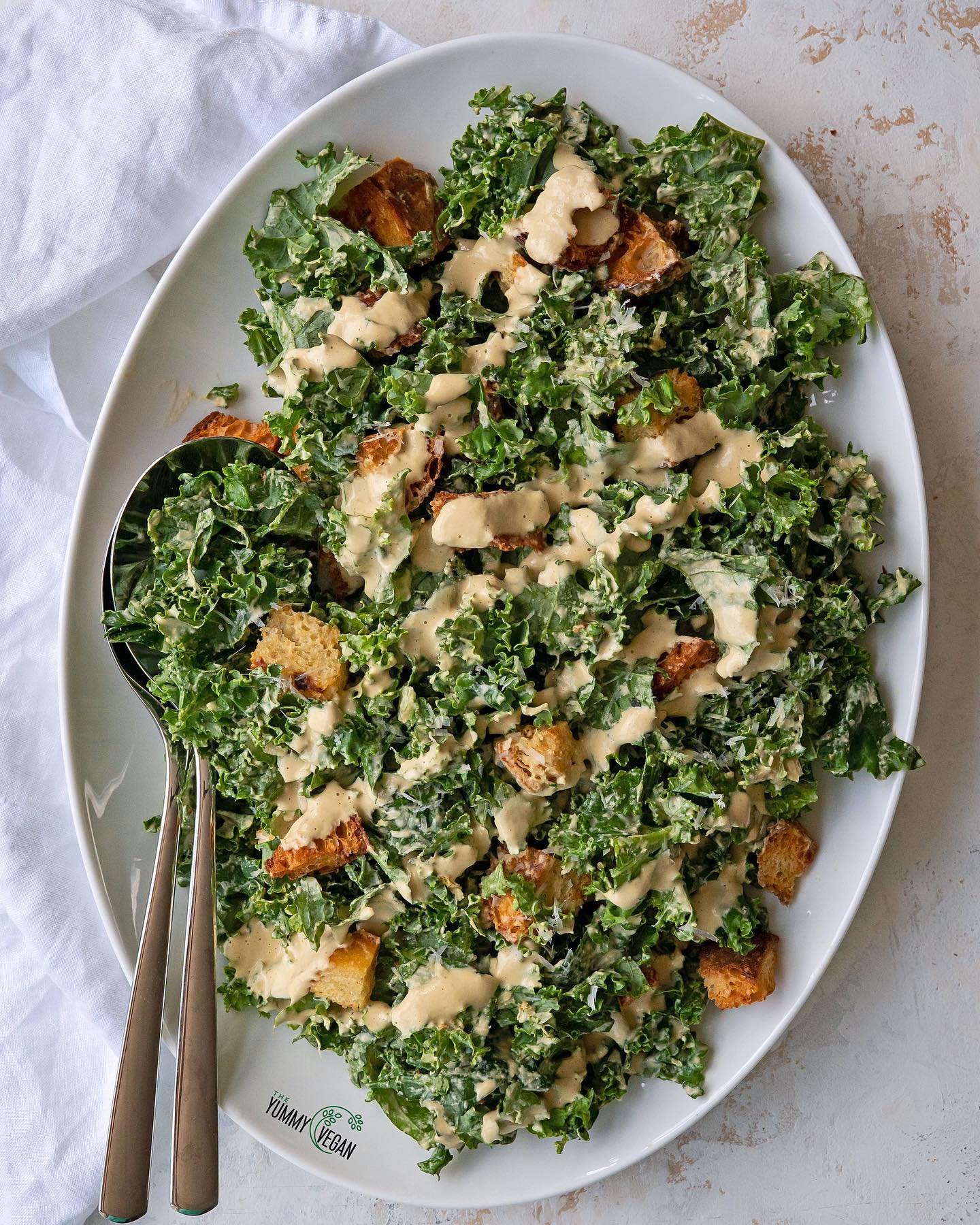 Massaged Kale Caesar Salad with Vegan Parmesan and Croutons