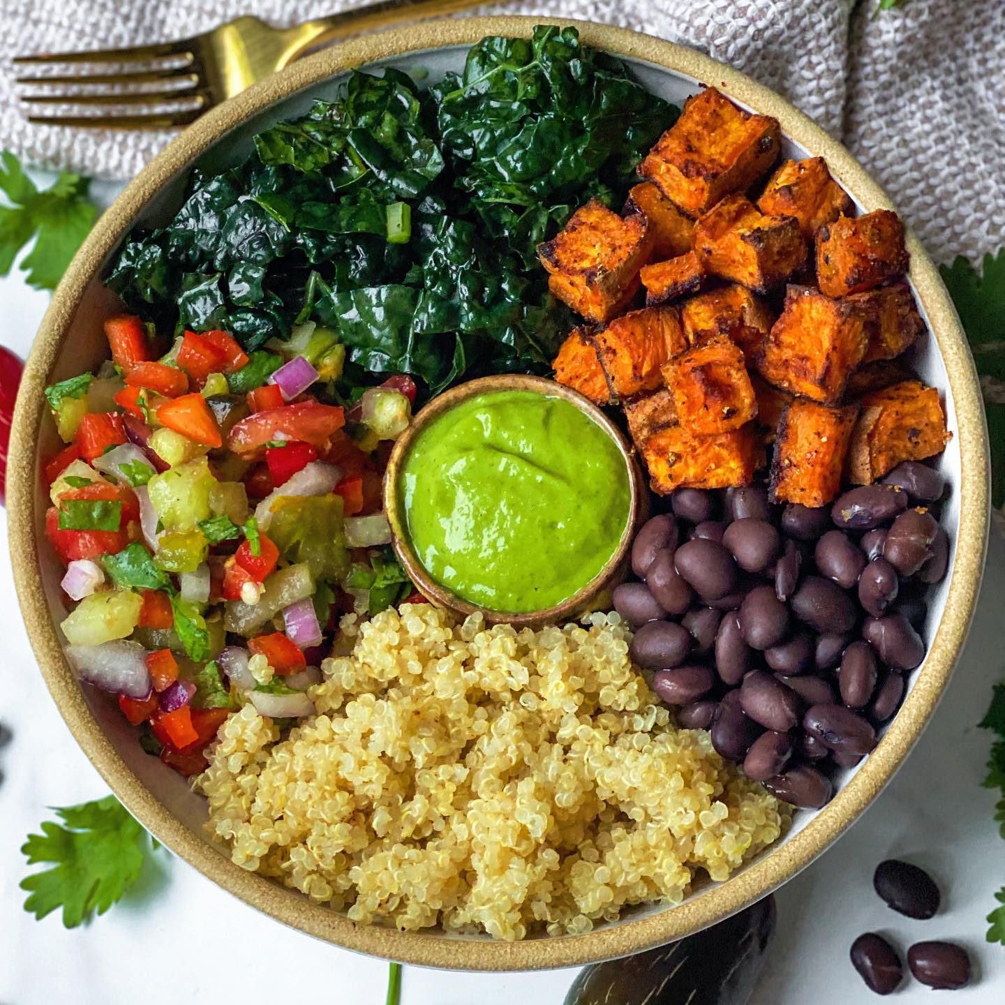 Sweet Potato and Black Bean Bowl with Avocado Crema