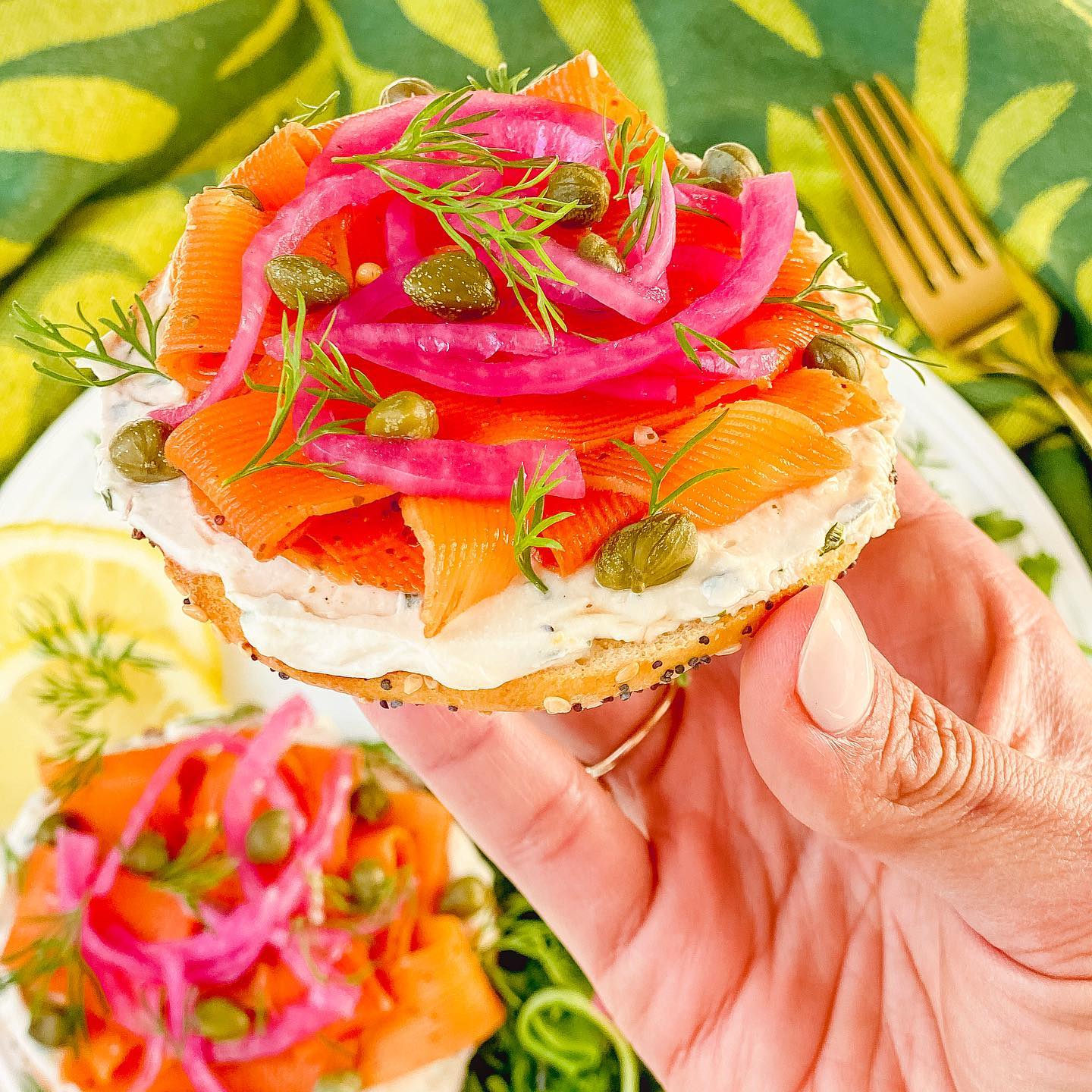 Carrot Lox Bagel with Pickled Onions