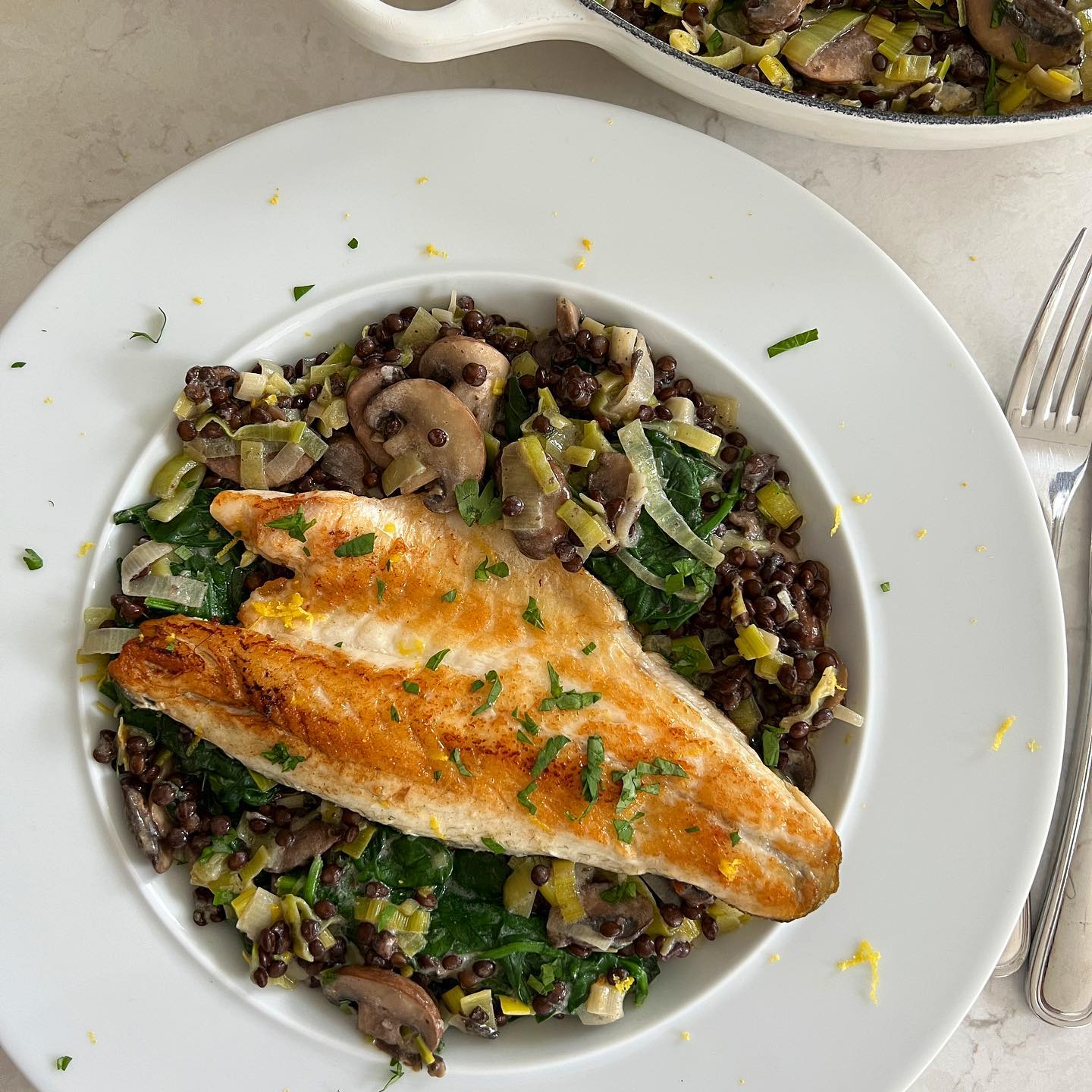 Pan-Seared Sea Bass with Lentil, Leek, and Mushroom Fricassee