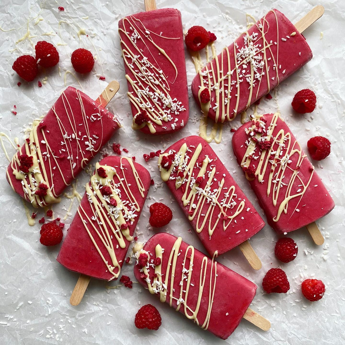 Raspberry and Coconut Ice Lollies with White Chocolate Drizzle