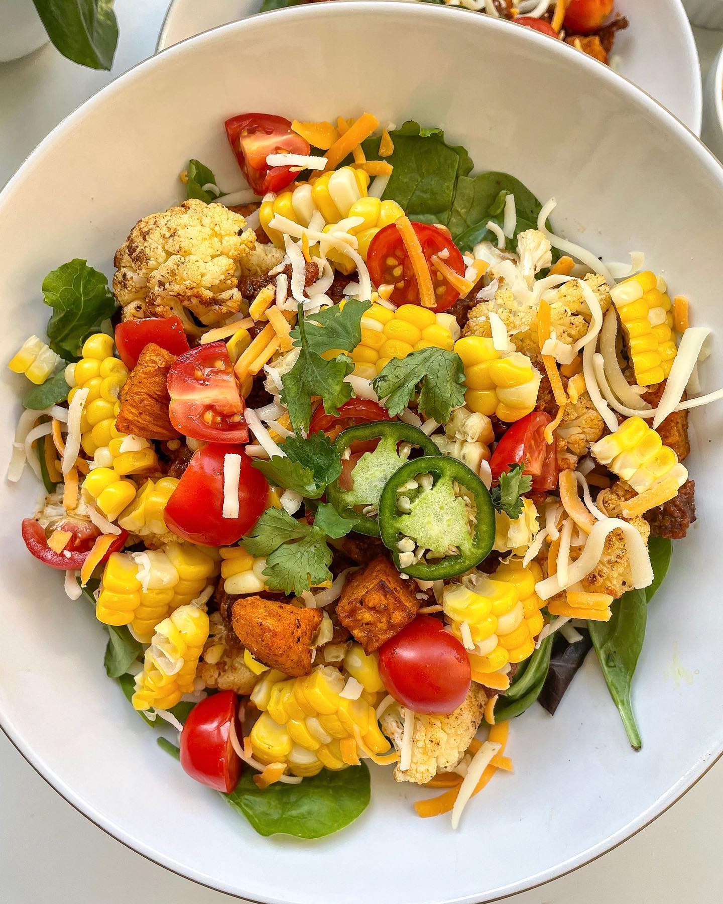 Roasted Cauliflower and Sweet Potato Taco Bowls