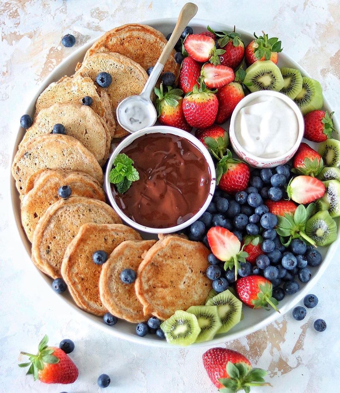 Pancake Platter with Fresh Fruits and Chocolate Sauce