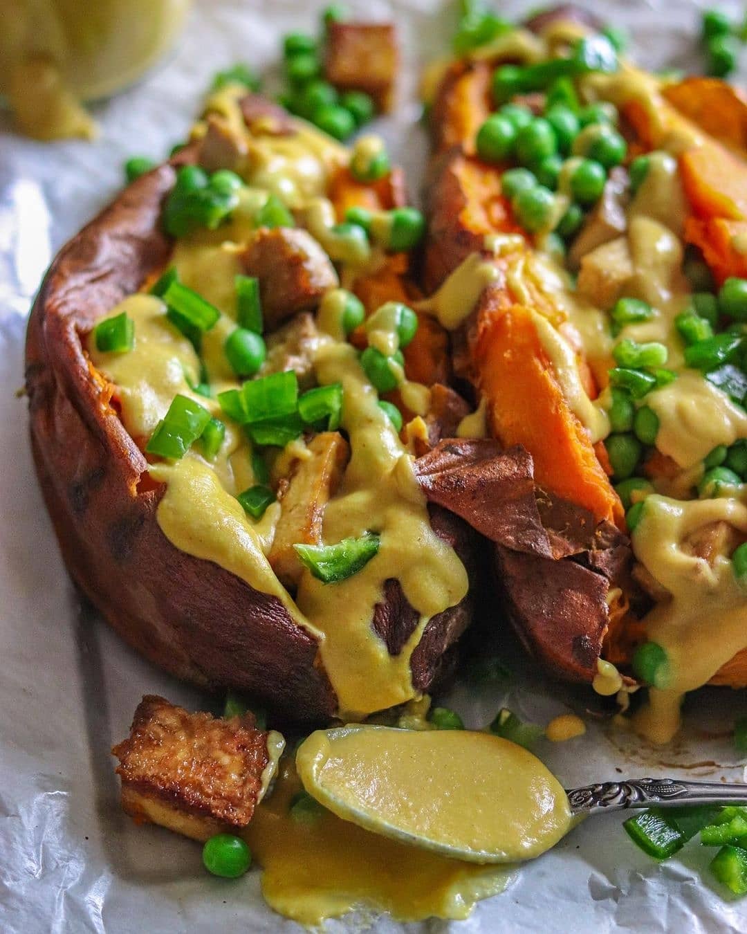 Loaded Baked Sweet Potatoes with Vegan Cheese Sauce