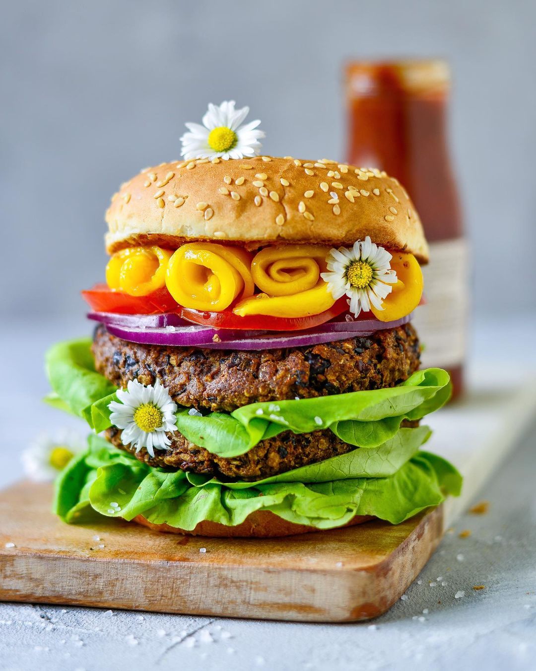 Vegan Black Beans Burger with BBQ Sauce and Mango Roses