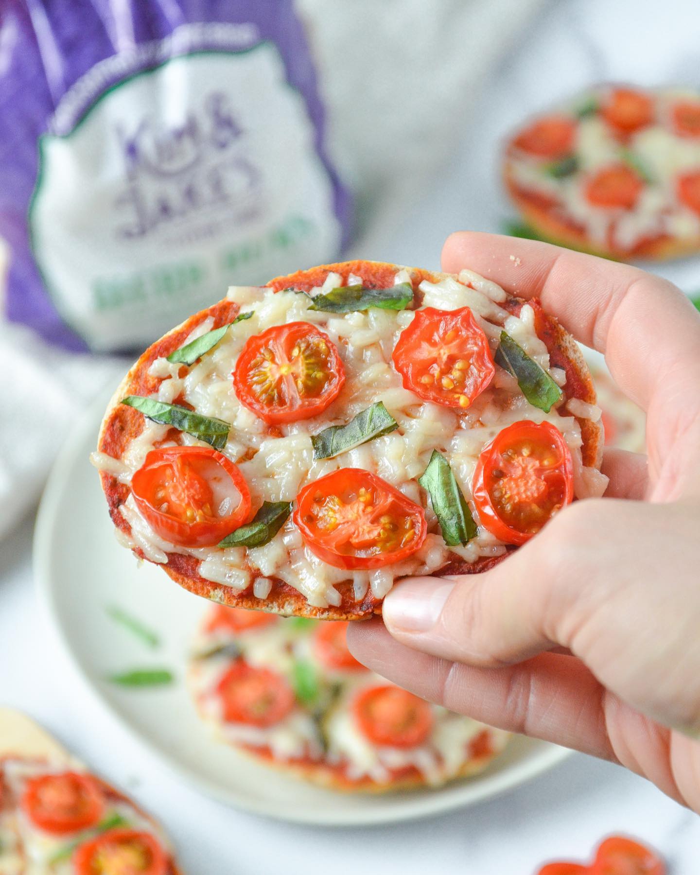 Herb Bun Pizza Toast with Vegan Cheese and Fresh Basil