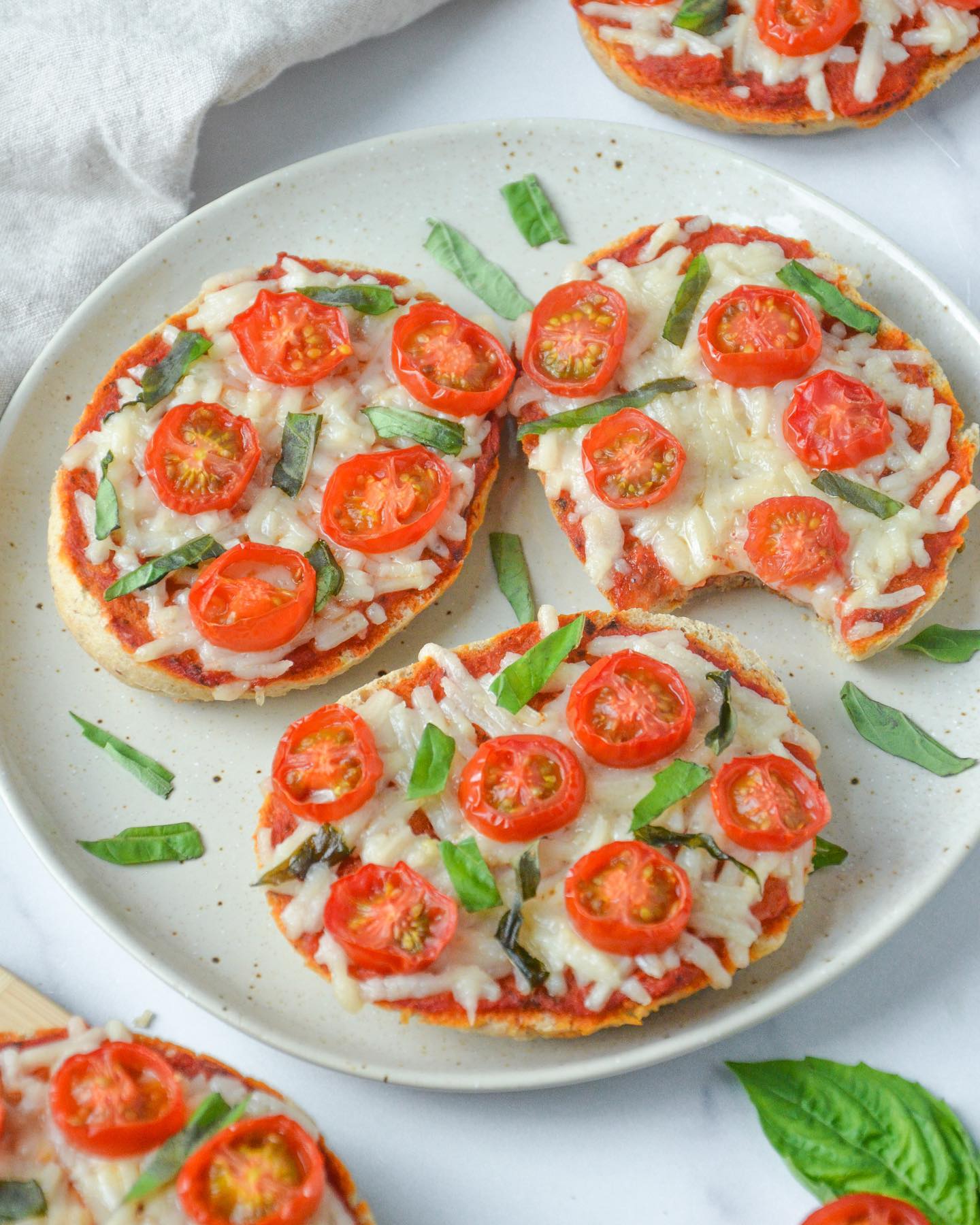 Herb Bun Pizza Toast with Vegan Cheese and Fresh Basil