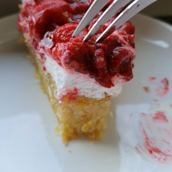 Moist Lemon Coconut Cake with Vegan Whipped Cream and Raspberry Topping