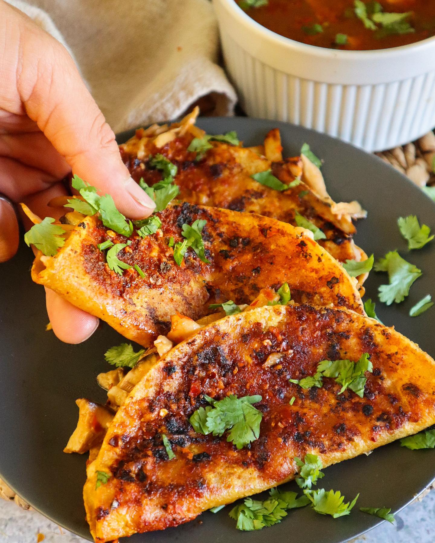 Cheesy Vegan Birria Quesabirria Tacos with Savory Broth