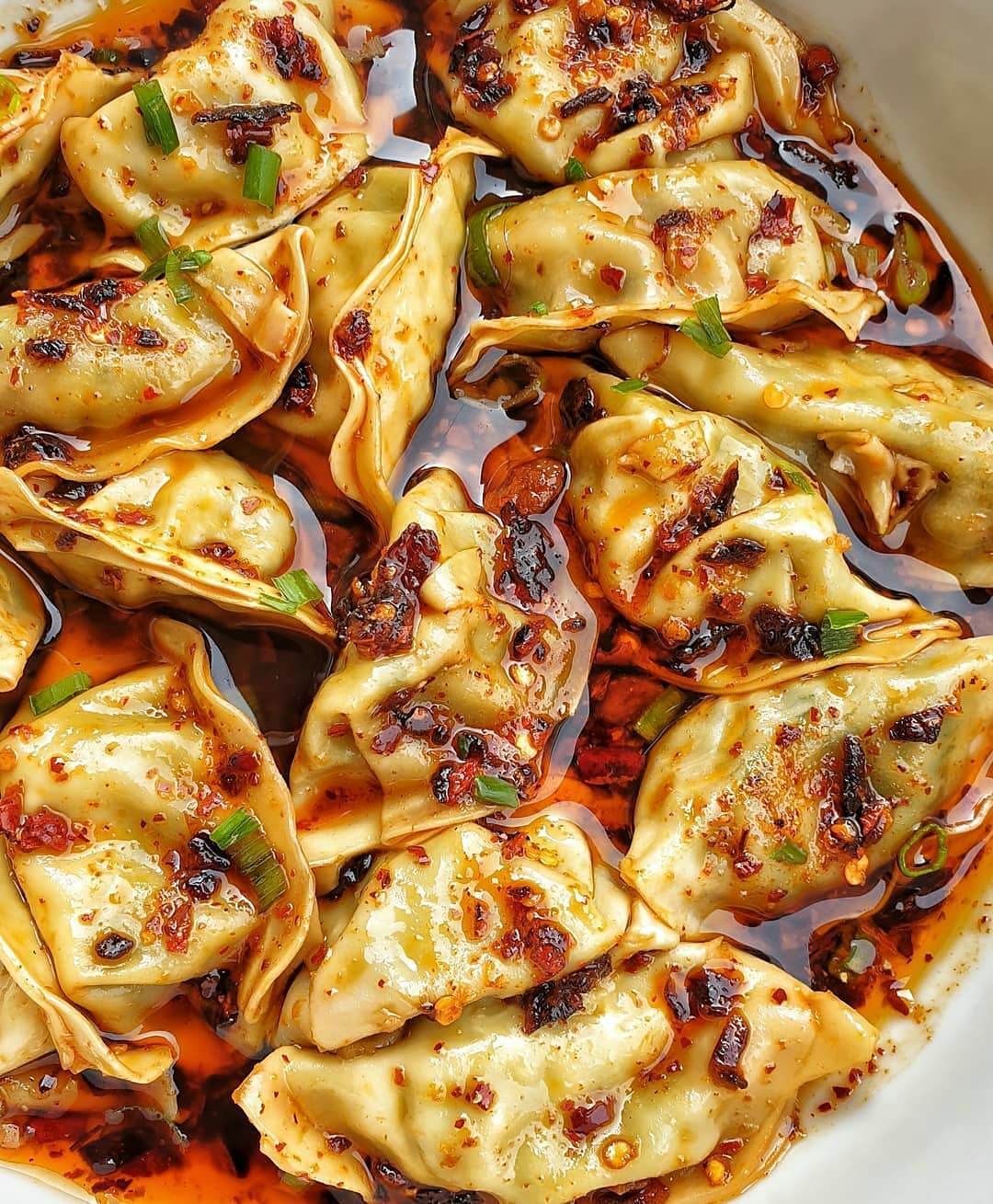 Vegan Dumplings in Sichuan Chili Soy Sauce with Pulled Oats and Scallion Stuffing