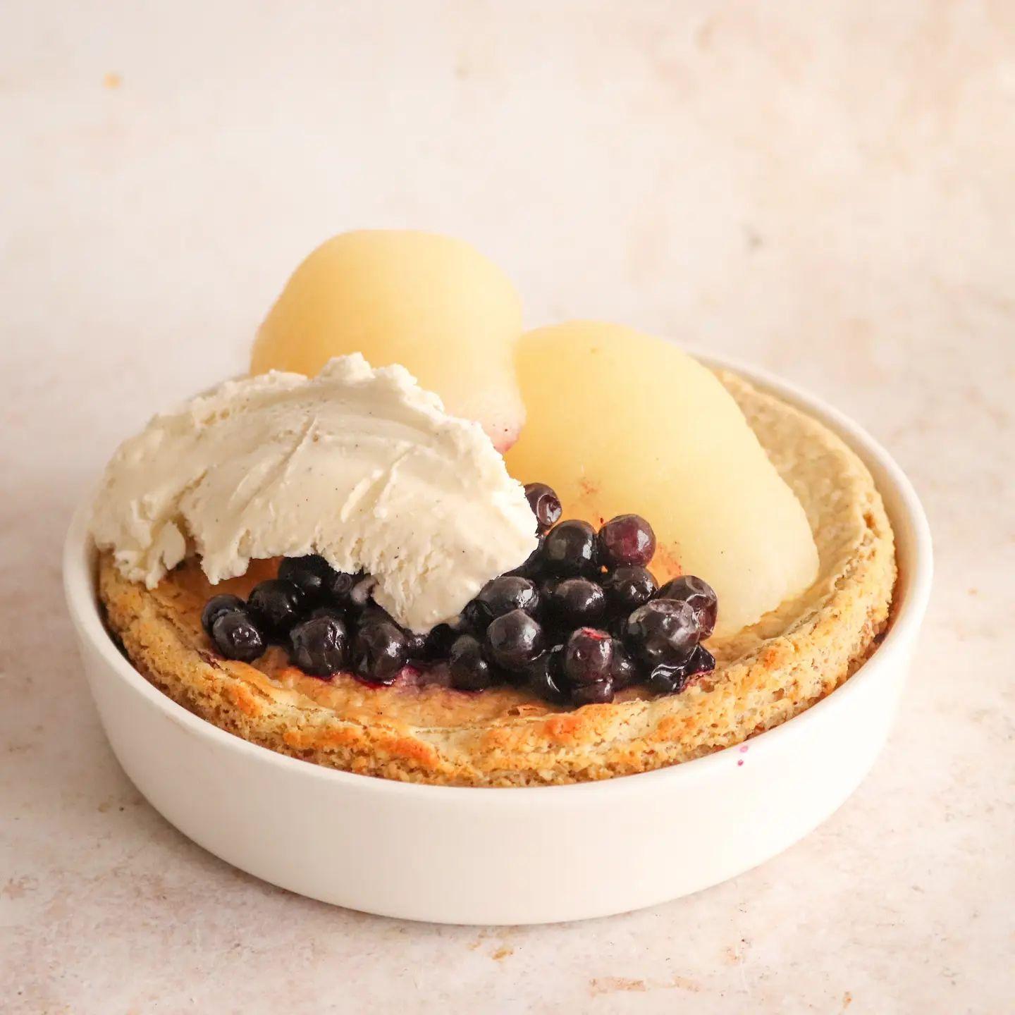 Vanilla-Cardamom Baked Oatmeal with Pear and Blueberry Topping