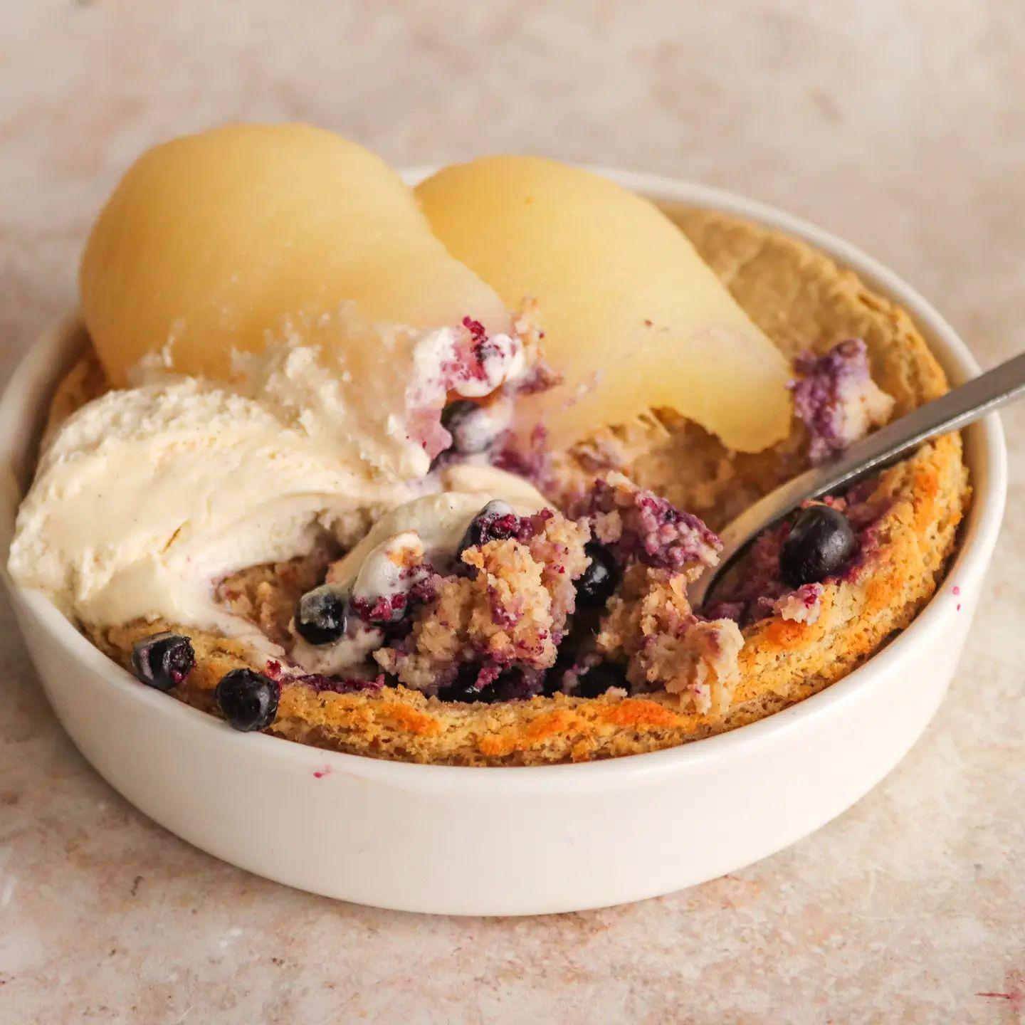 Vanilla-Cardamom Baked Oatmeal with Pear and Blueberry Topping