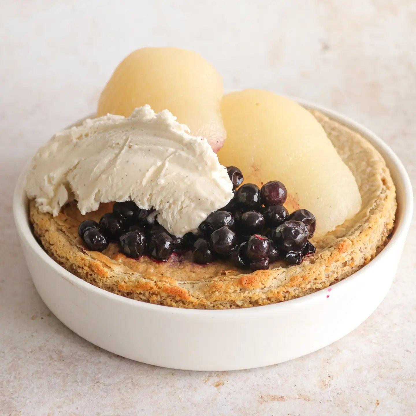 Vanilla-Cardamom Baked Oatmeal with Pear and Blueberry Topping