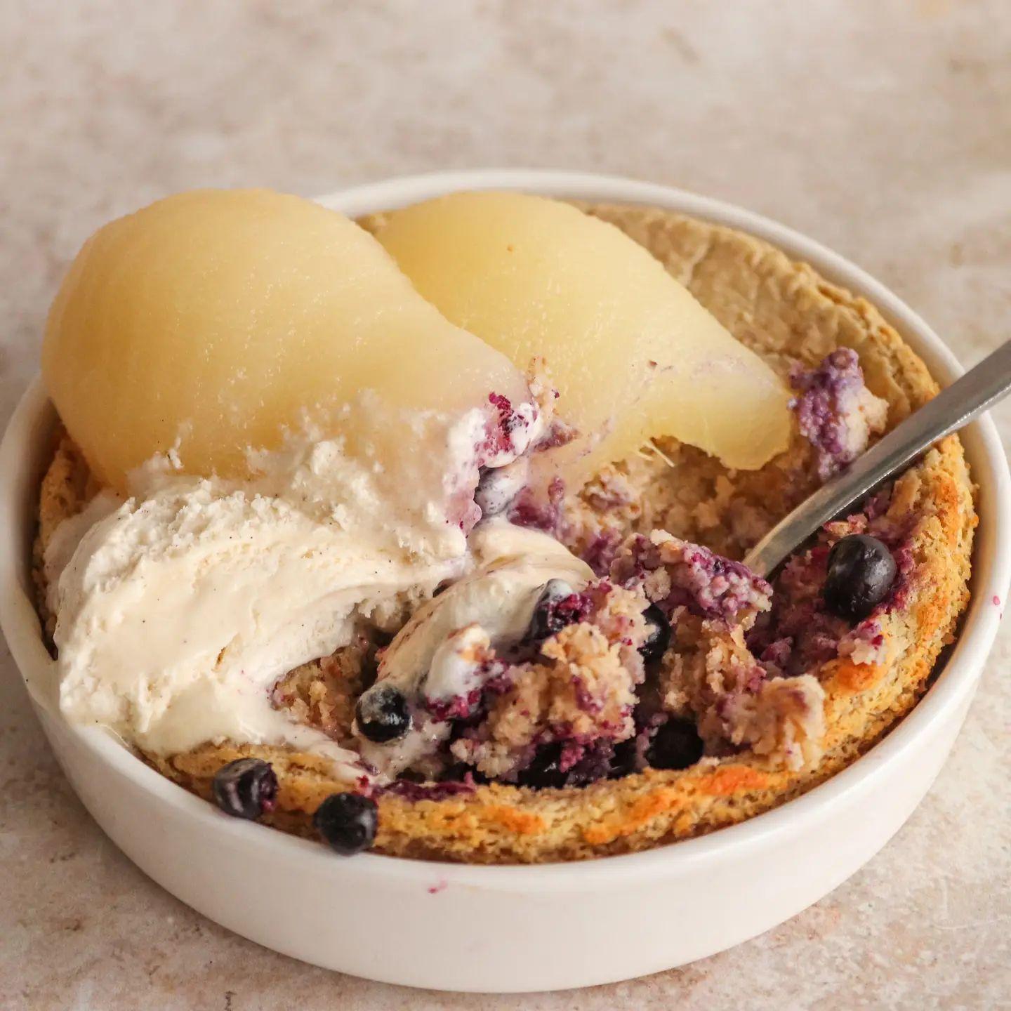 Vanilla-Cardamom Baked Oatmeal with Pear and Blueberry Topping