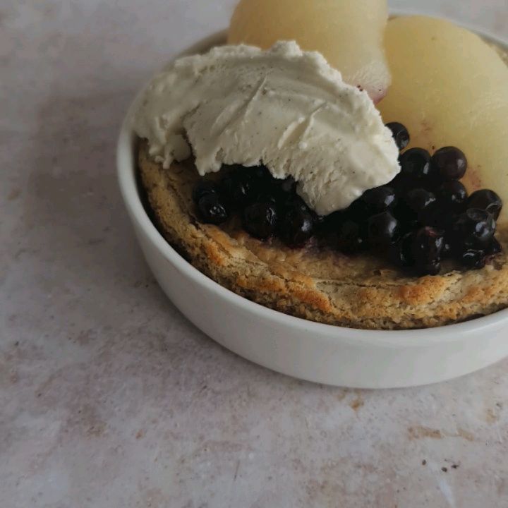 Vanilla-Cardamom Baked Oatmeal with Pear and Blueberry Topping