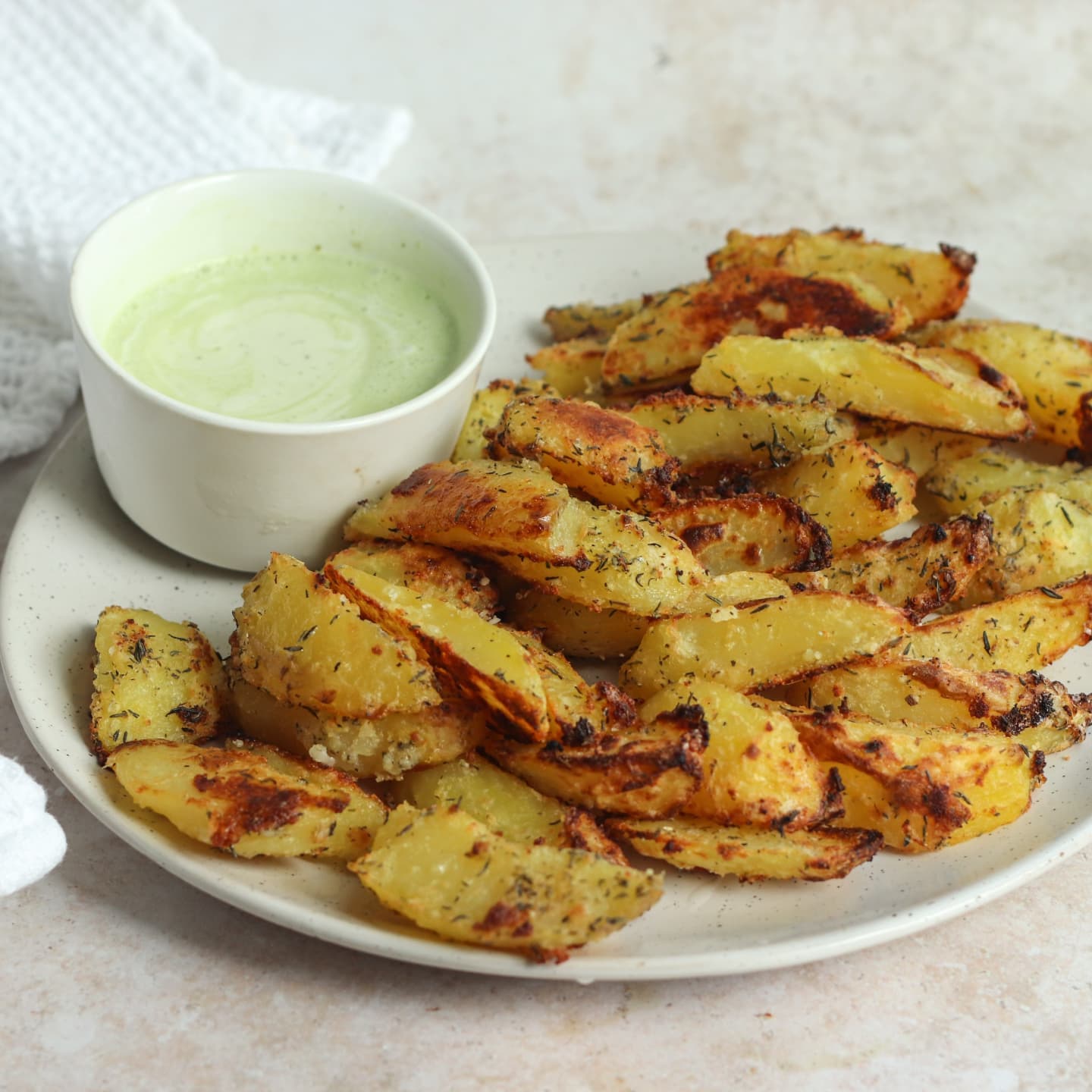 Baked Garlic Thyme Potato Fries with Vegan Avocado Lime Sauce