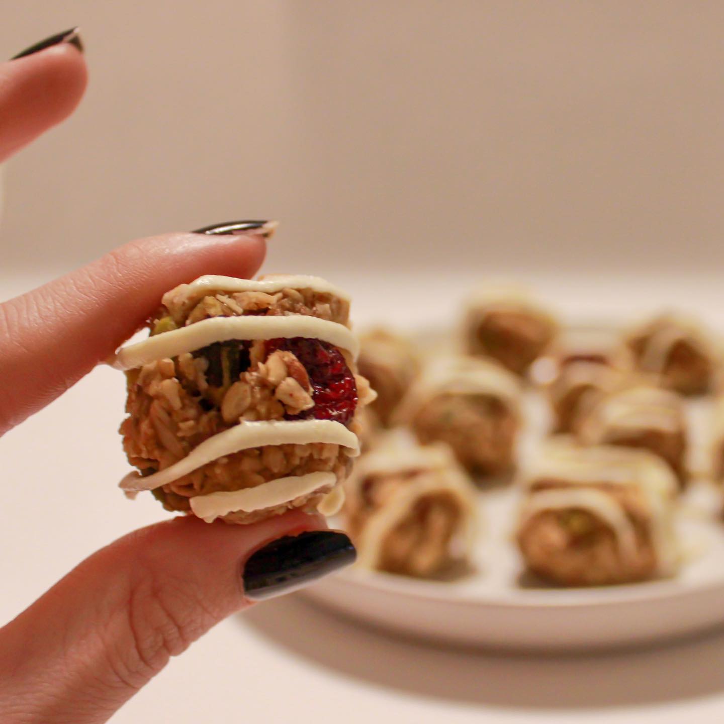 Vegan Cranberry Pistachio Energy Balls with Homemade White Chocolate Drizzle