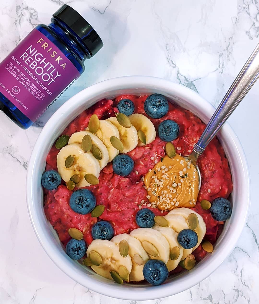 Pink Oatmeal Bowl with Beets and Toppings