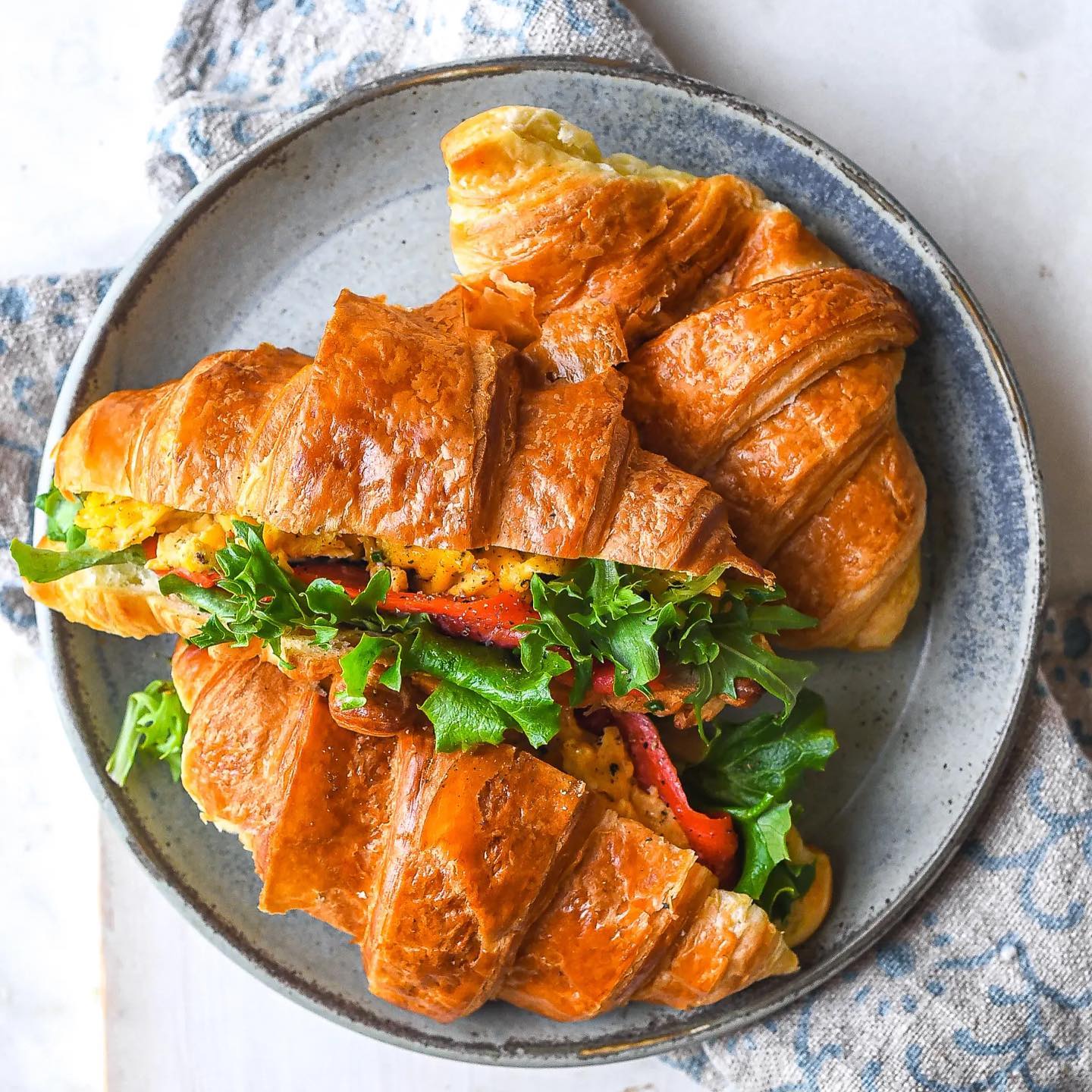 Croissant Breakfast Sandwich with Salmon and Eggs