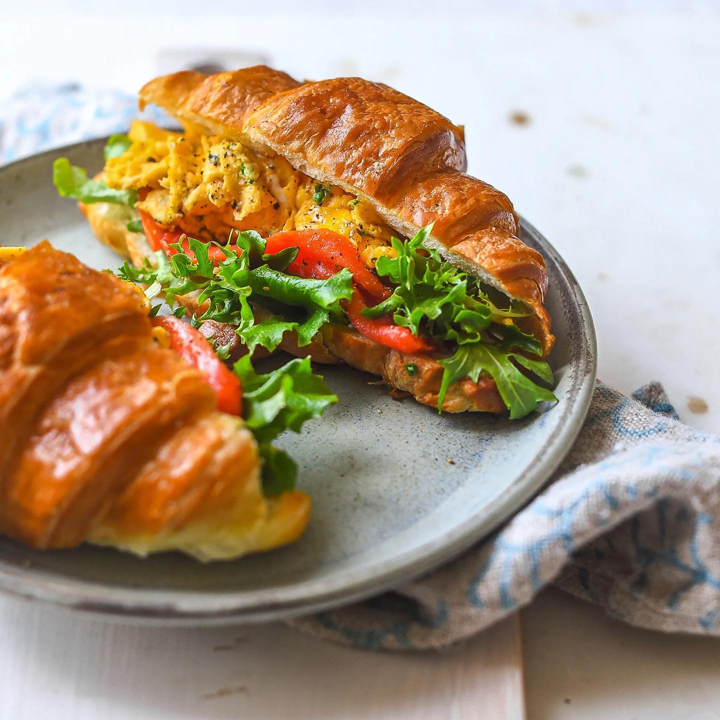Croissant Breakfast Sandwich with Salmon and Eggs