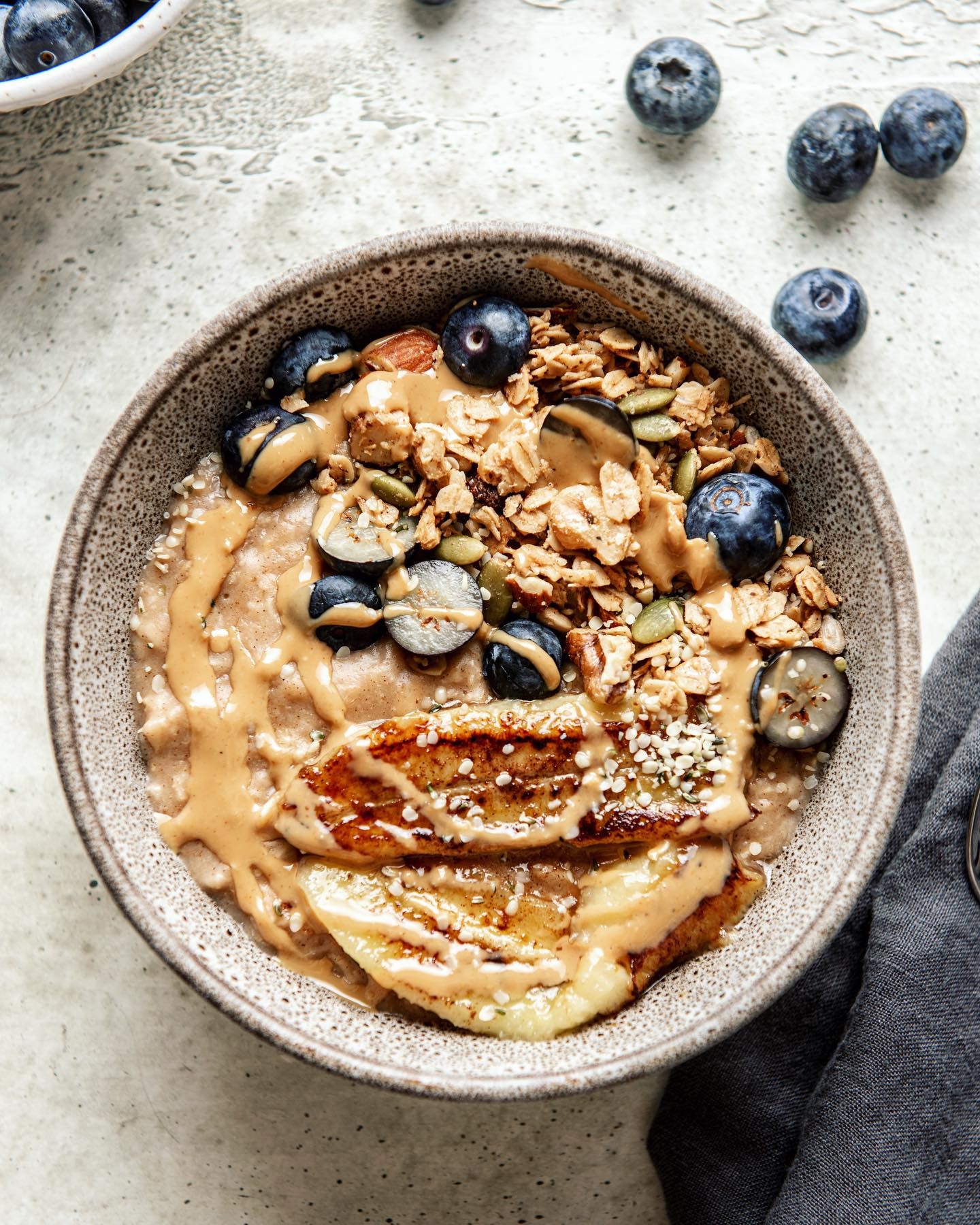 Caramelized Banana Oatmeal with Warm Peanut Butter