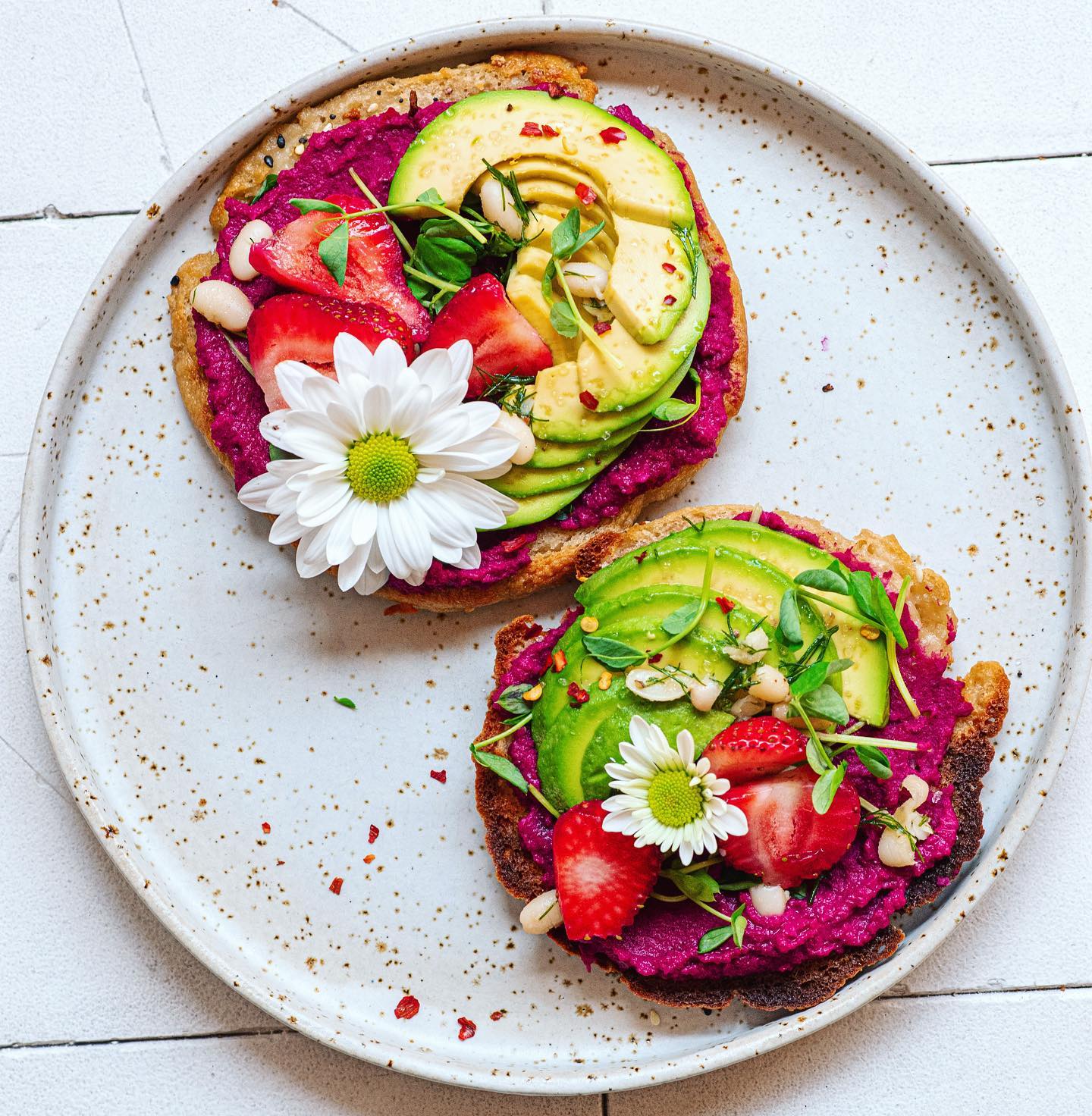 Bagel with Beet Hummus and Fresh Toppings