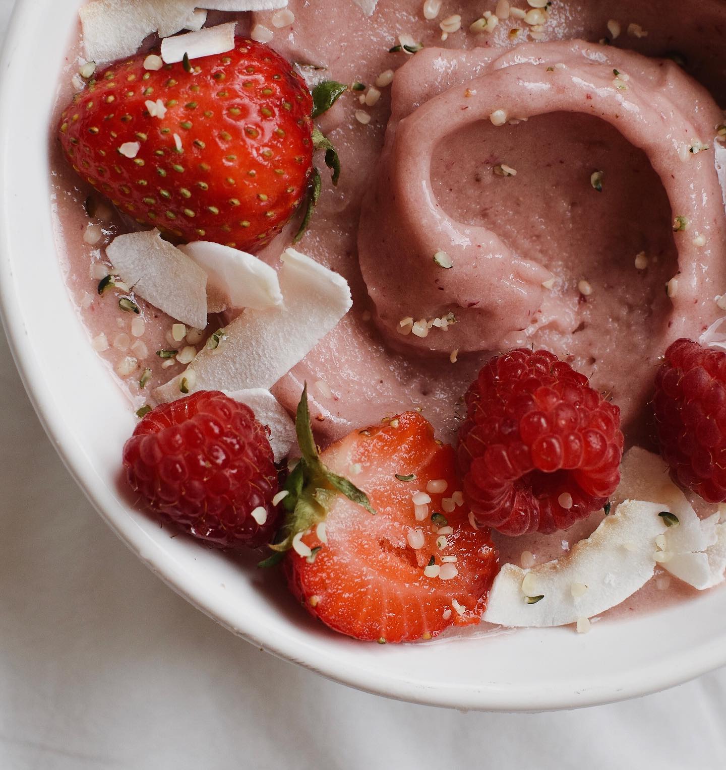 Strawberry Banana Smoothie with Berries, Coconut Flakes, and Hemp Seeds