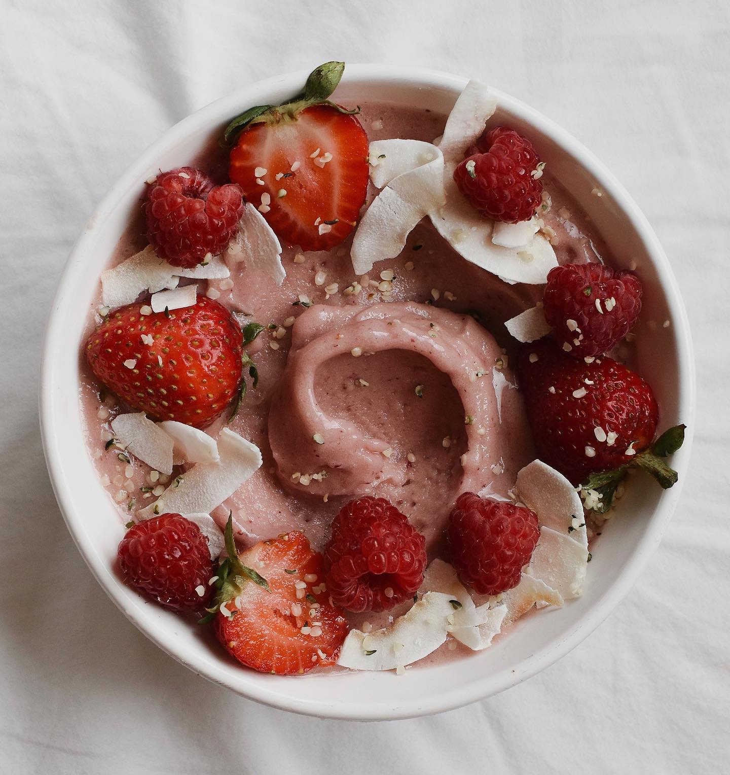 Strawberry Banana Smoothie with Berries, Coconut Flakes, and Hemp Seeds