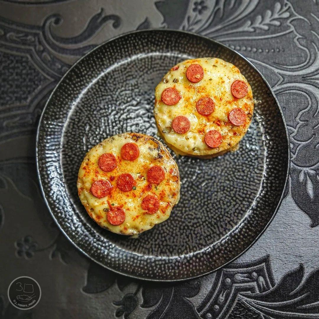 Quick Pizza Crumpets with Cheese Toppings