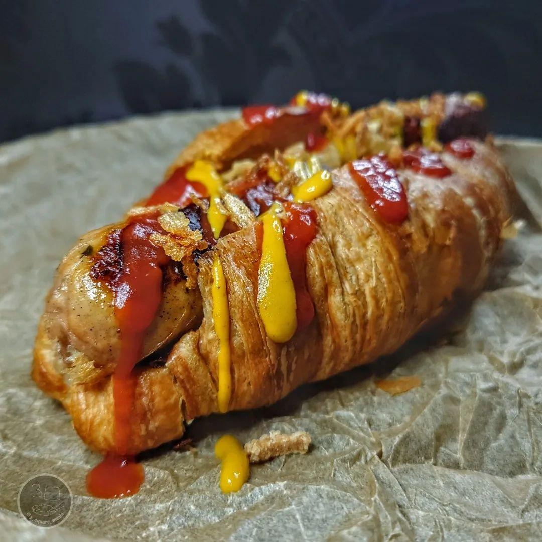 Croissant Dog with Sausages and Condiments