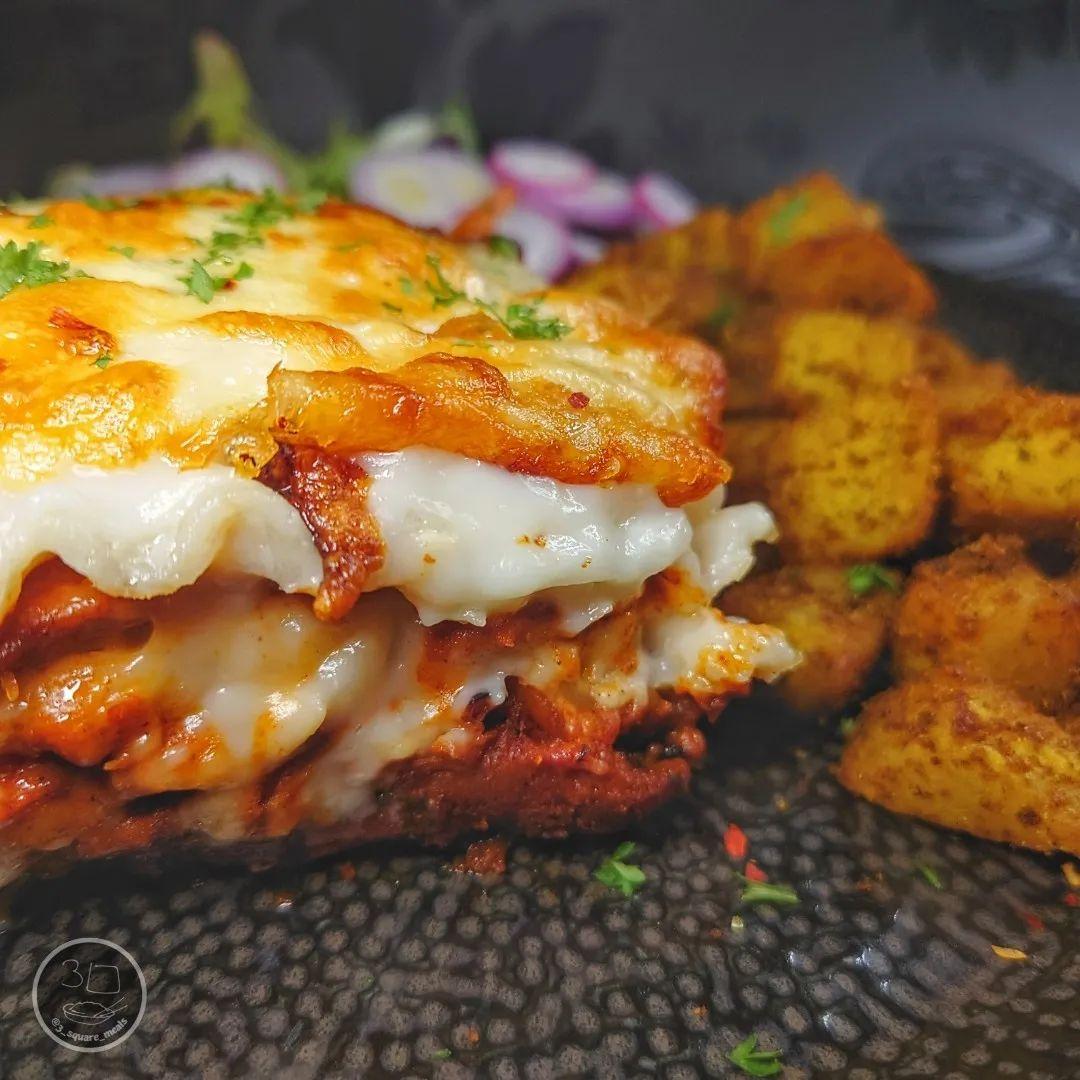 Creamy Tikka Lasagne with Bombay Potatoes