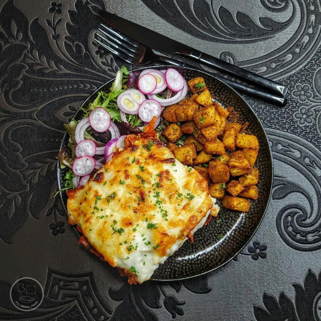 Creamy Tikka Lasagne with Bombay Potatoes
