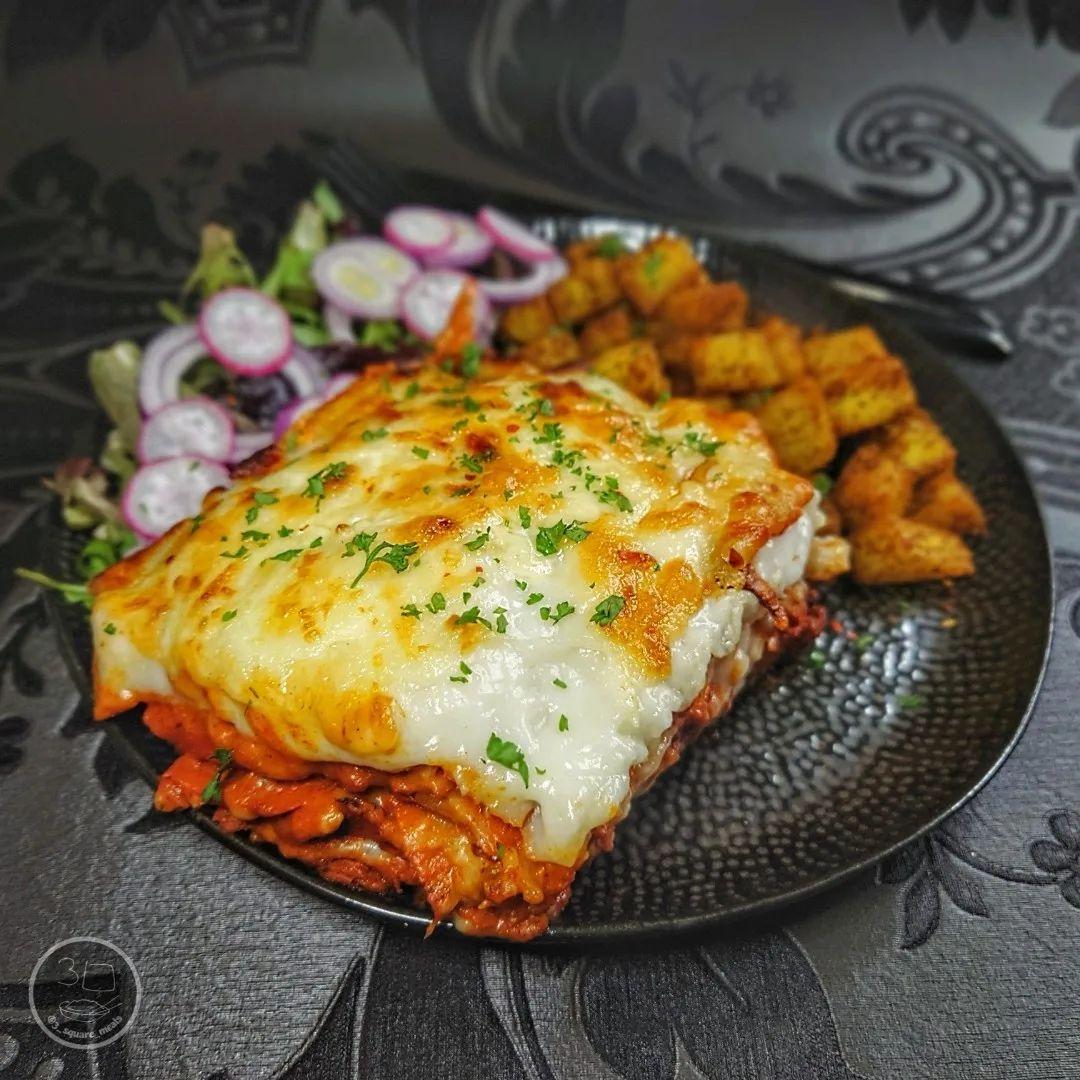 Creamy Tikka Lasagne with Bombay Potatoes